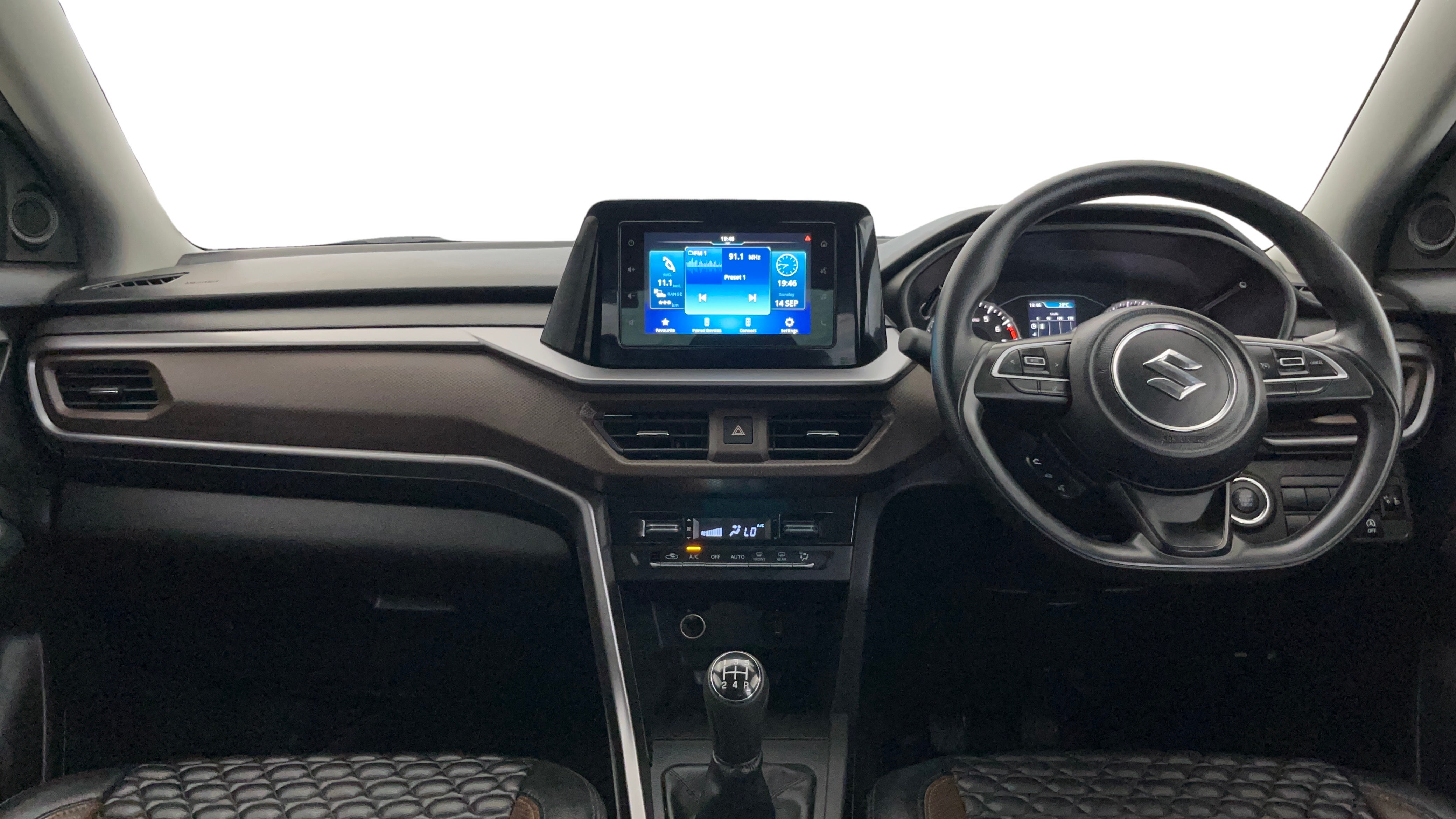 Dashboard and steering wheel of a Maruti Suzuki Brezza
