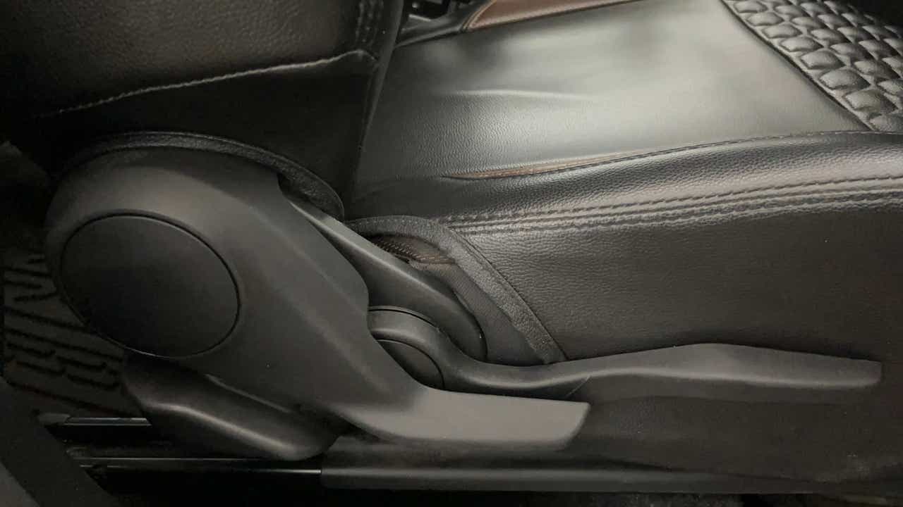 Side seat adjustment lever of a Maruti Suzuki Brezza