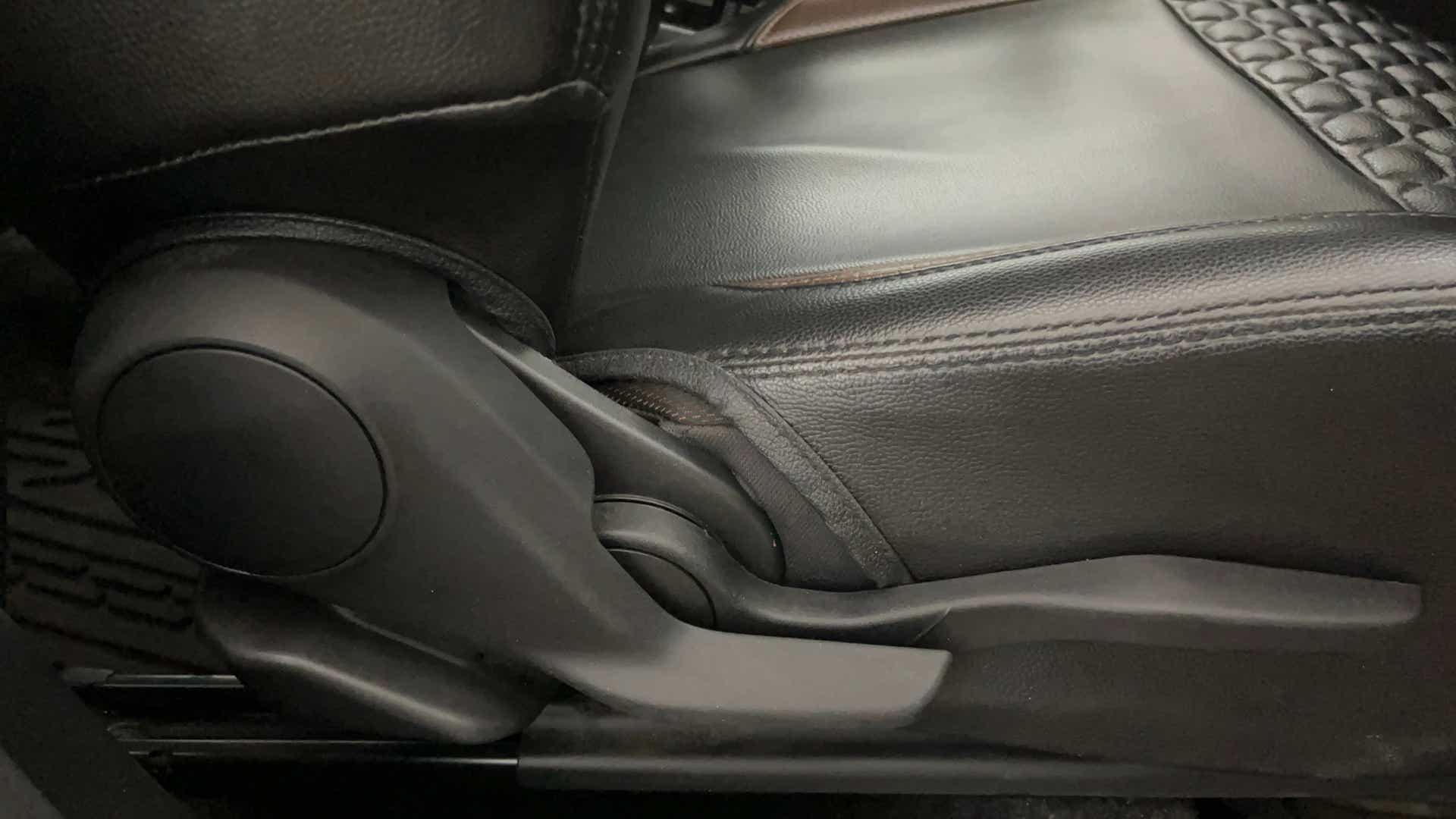 Side seat adjustment lever of a Maruti Suzuki Brezza