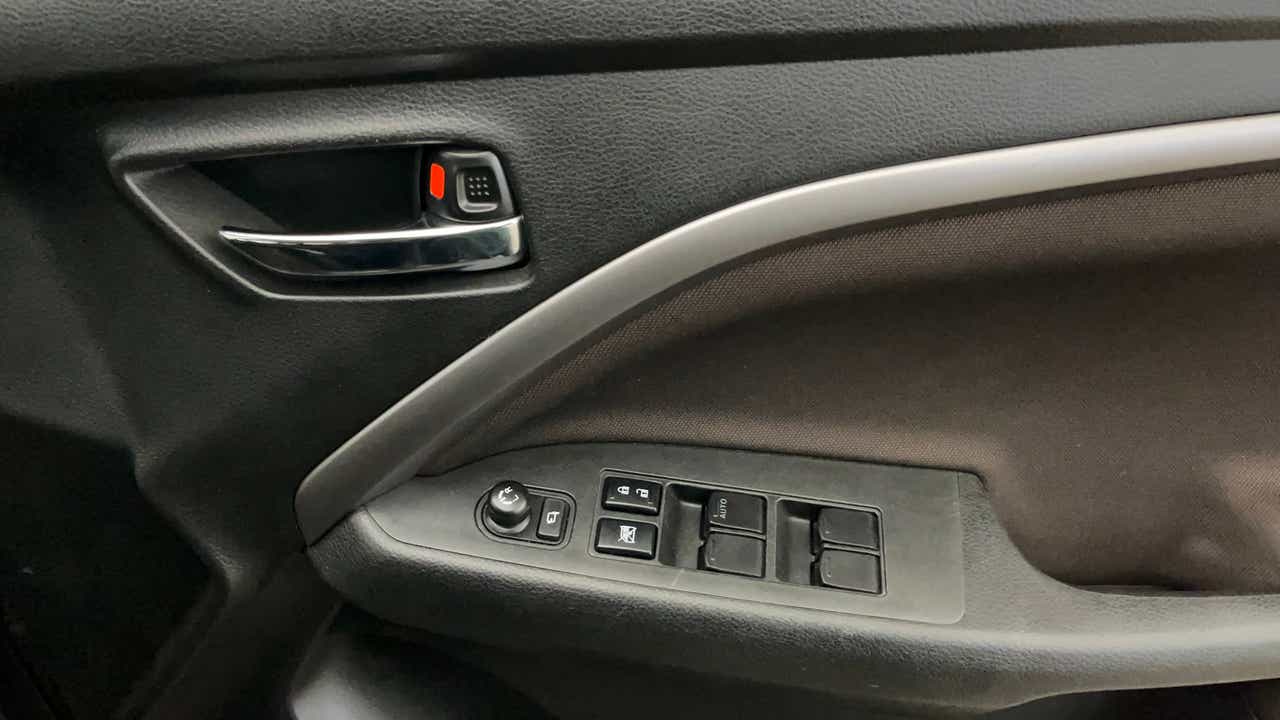 Front door panel controls of a Maruti Suzuki Brezza