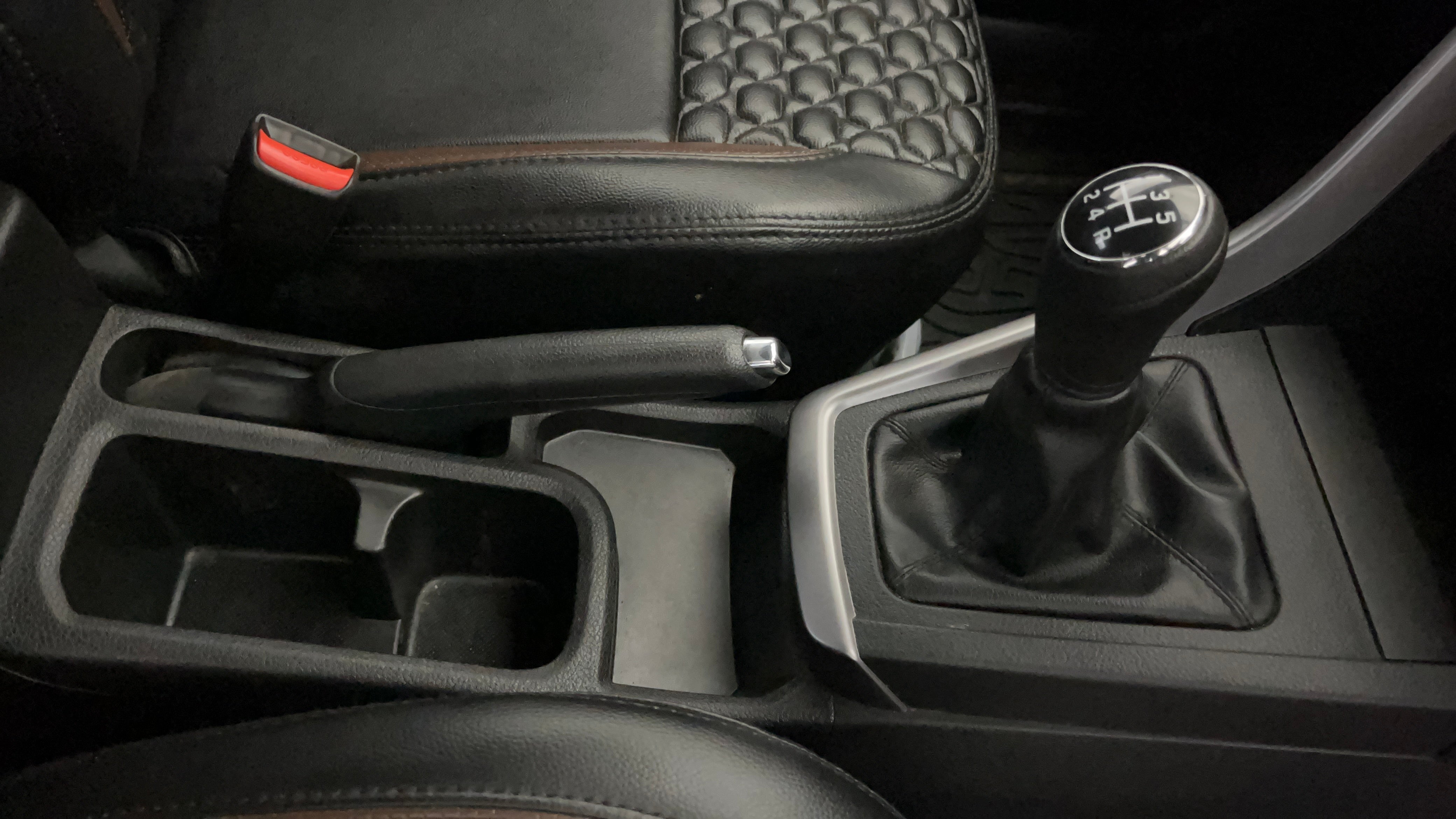 Center console and gear shifter of a Maruti Suzuki Brezza