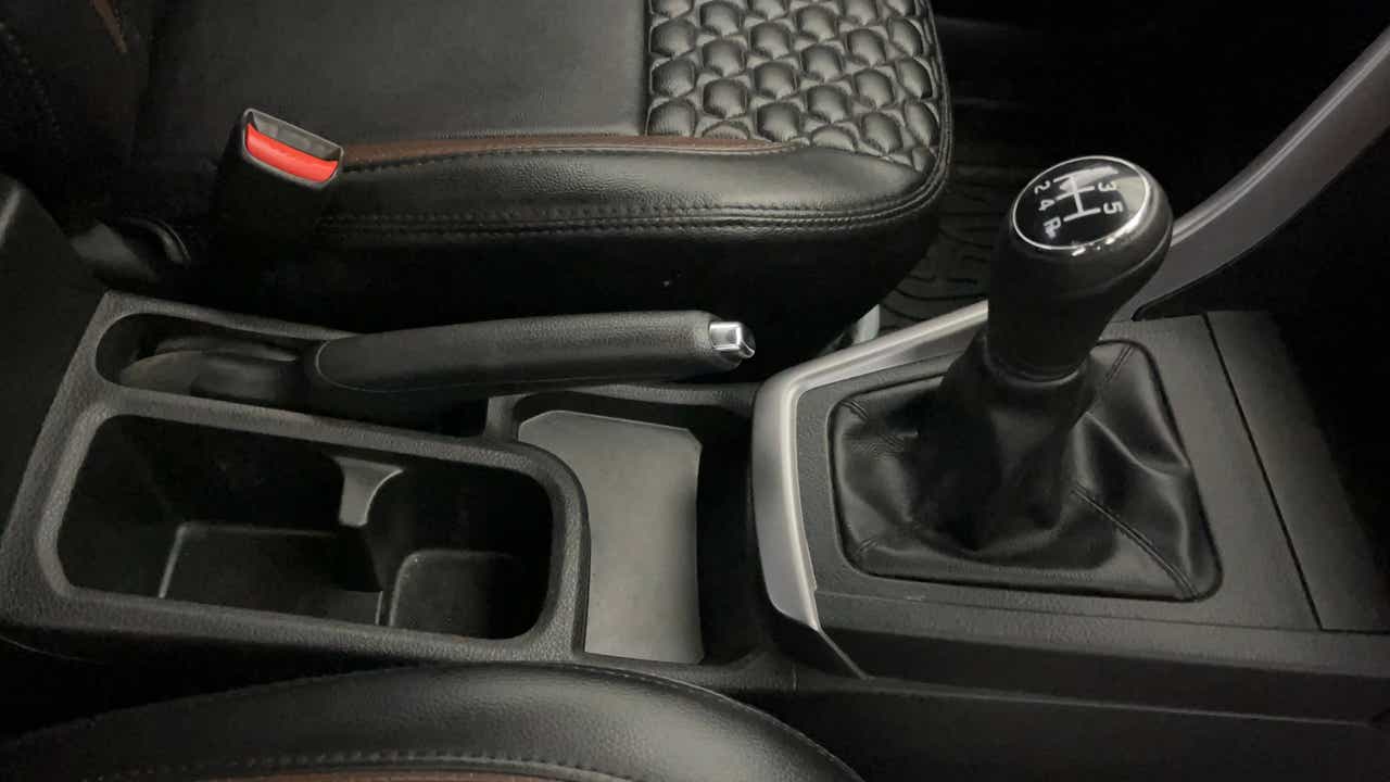Center console and gear shifter of a Maruti Suzuki Brezza