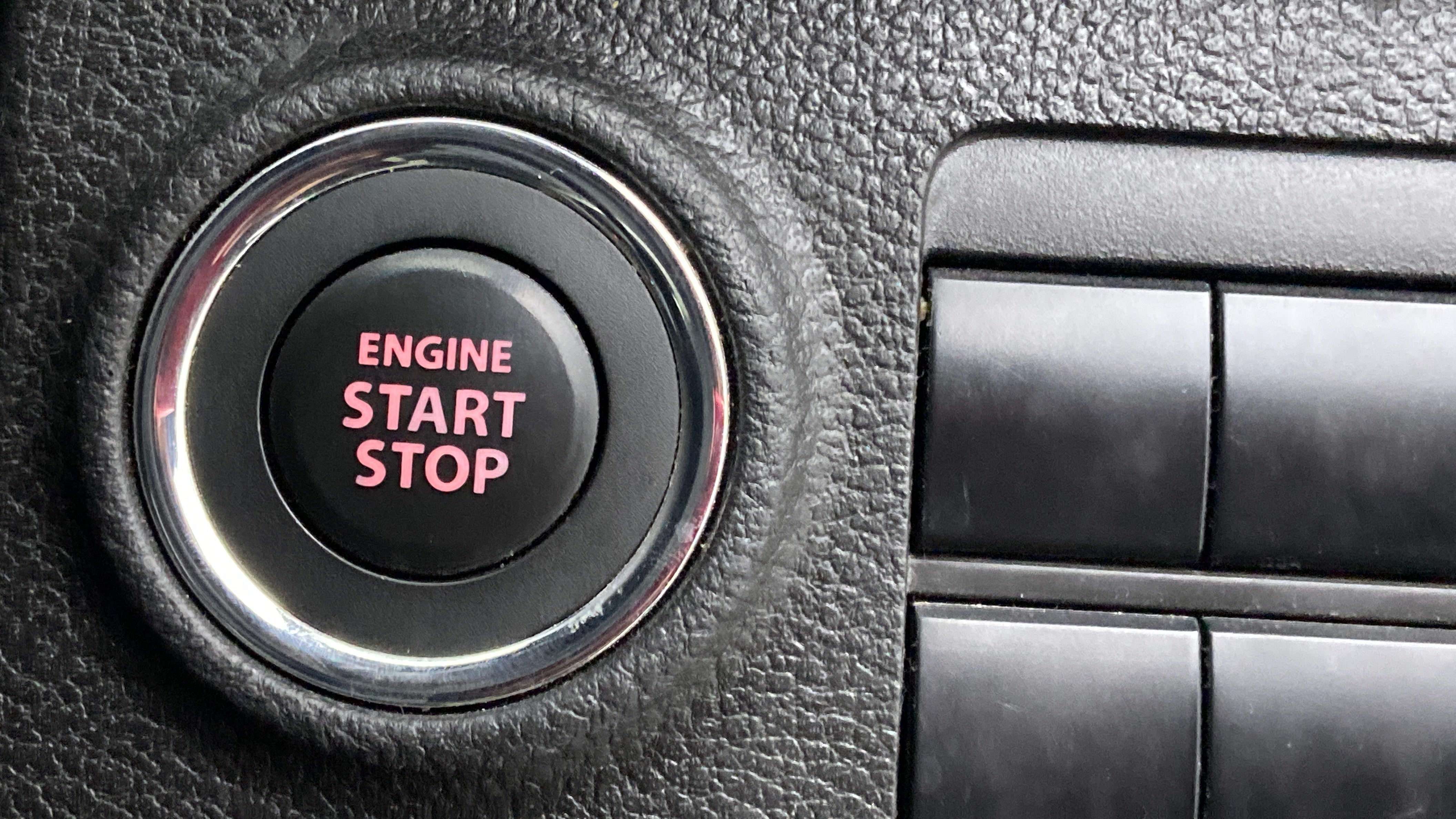 Engine start stop button of a Maruti Suzuki Brezza