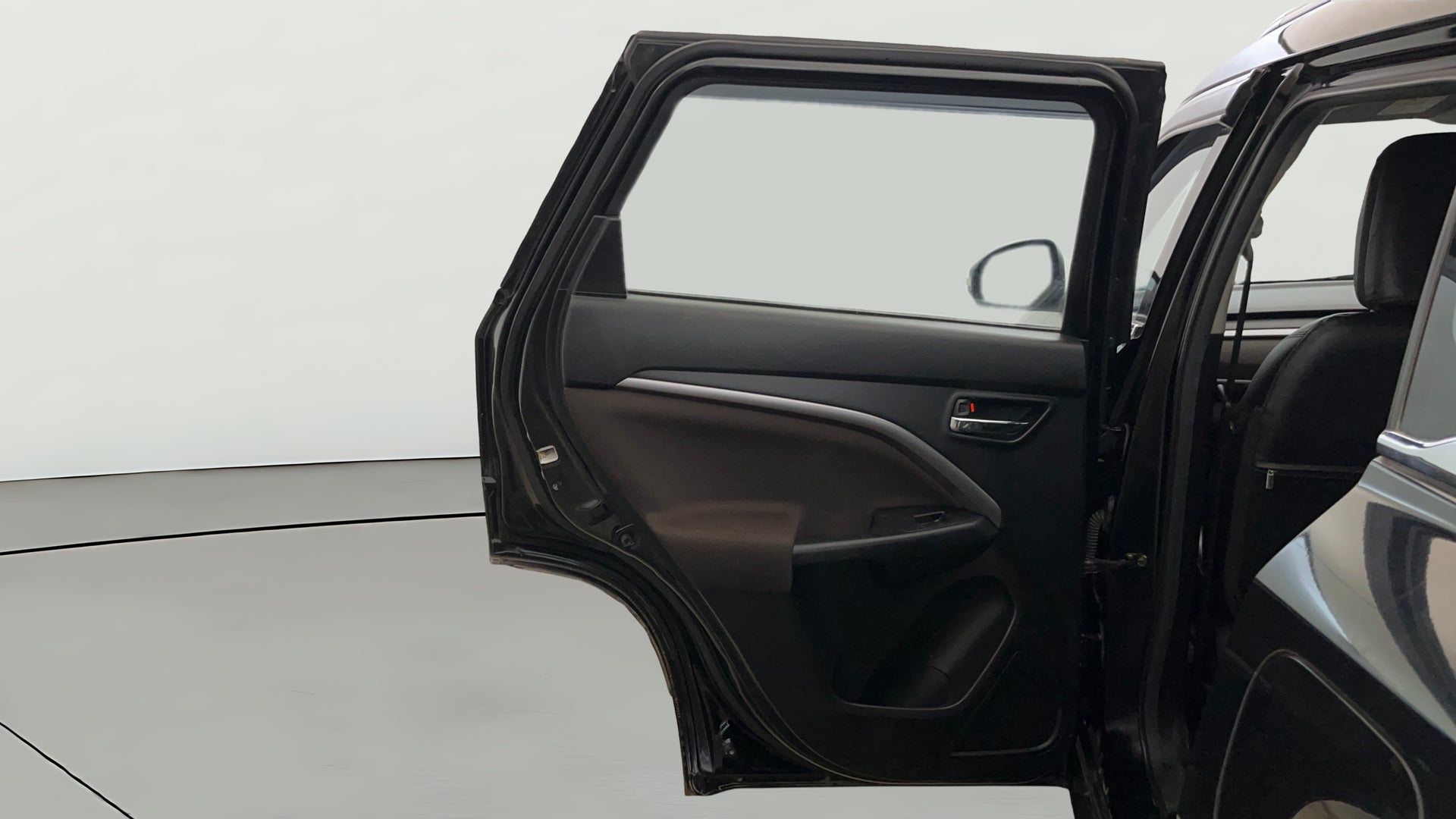 Rear door interior view of a Maruti Suzuki Brezza