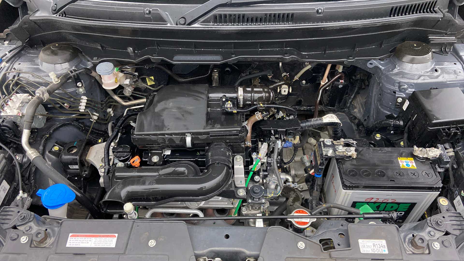 Engine bay of a Maruti Suzuki Brezza
