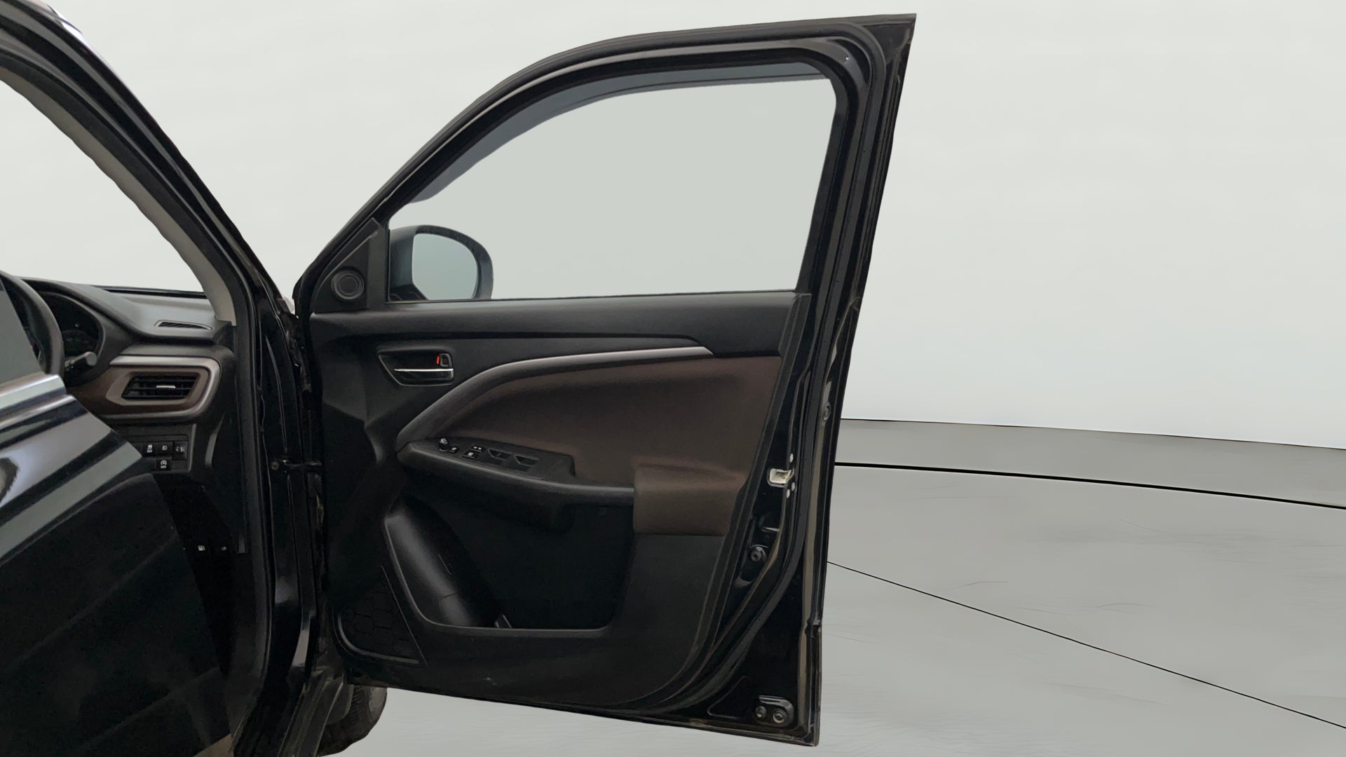 Driver side door panel of a Maruti Suzuki Brezza