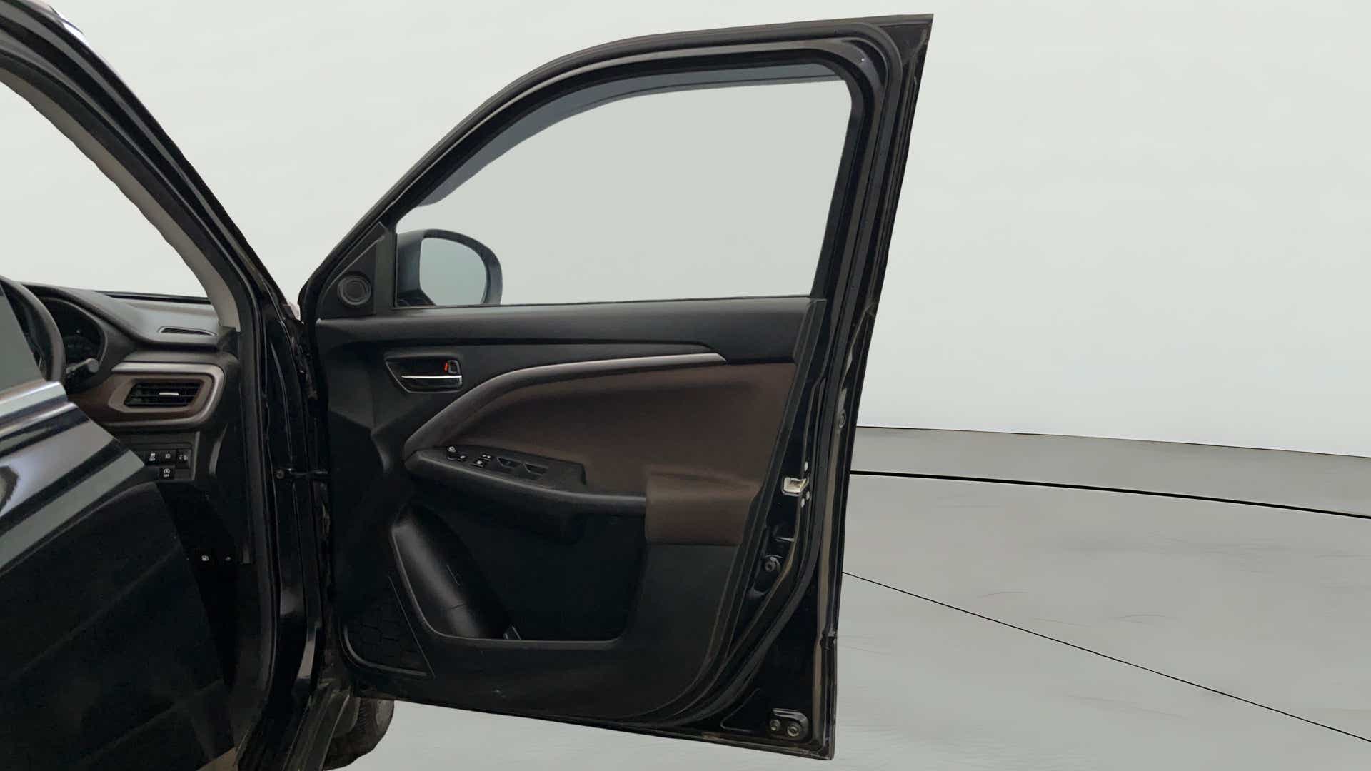 Driver side door panel of a Maruti Suzuki Brezza