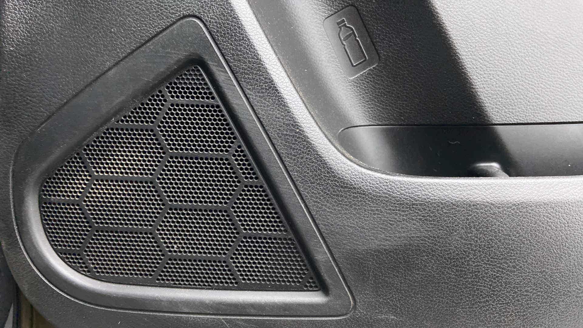 Close-up of speaker grille in a Maruti Suzuki Brezza