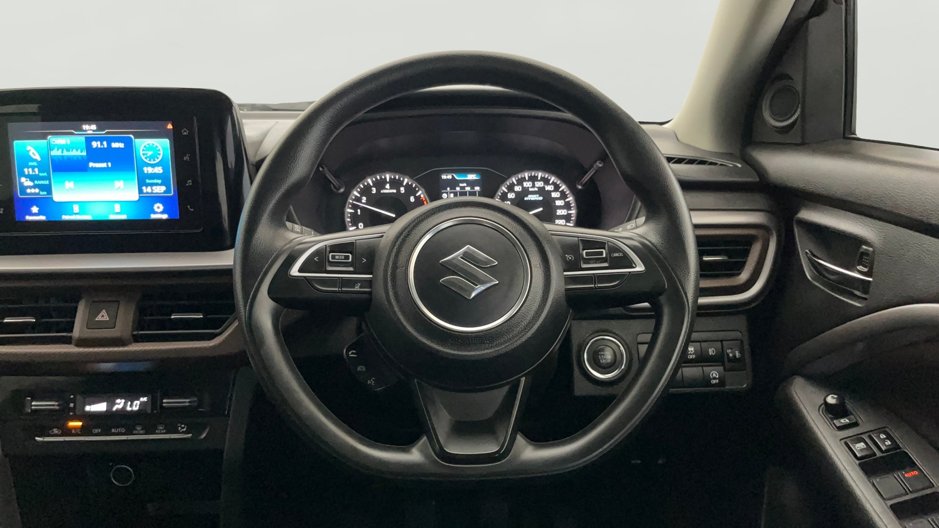 Dashboard and steering wheel of a Maruti Suzuki Brezza
