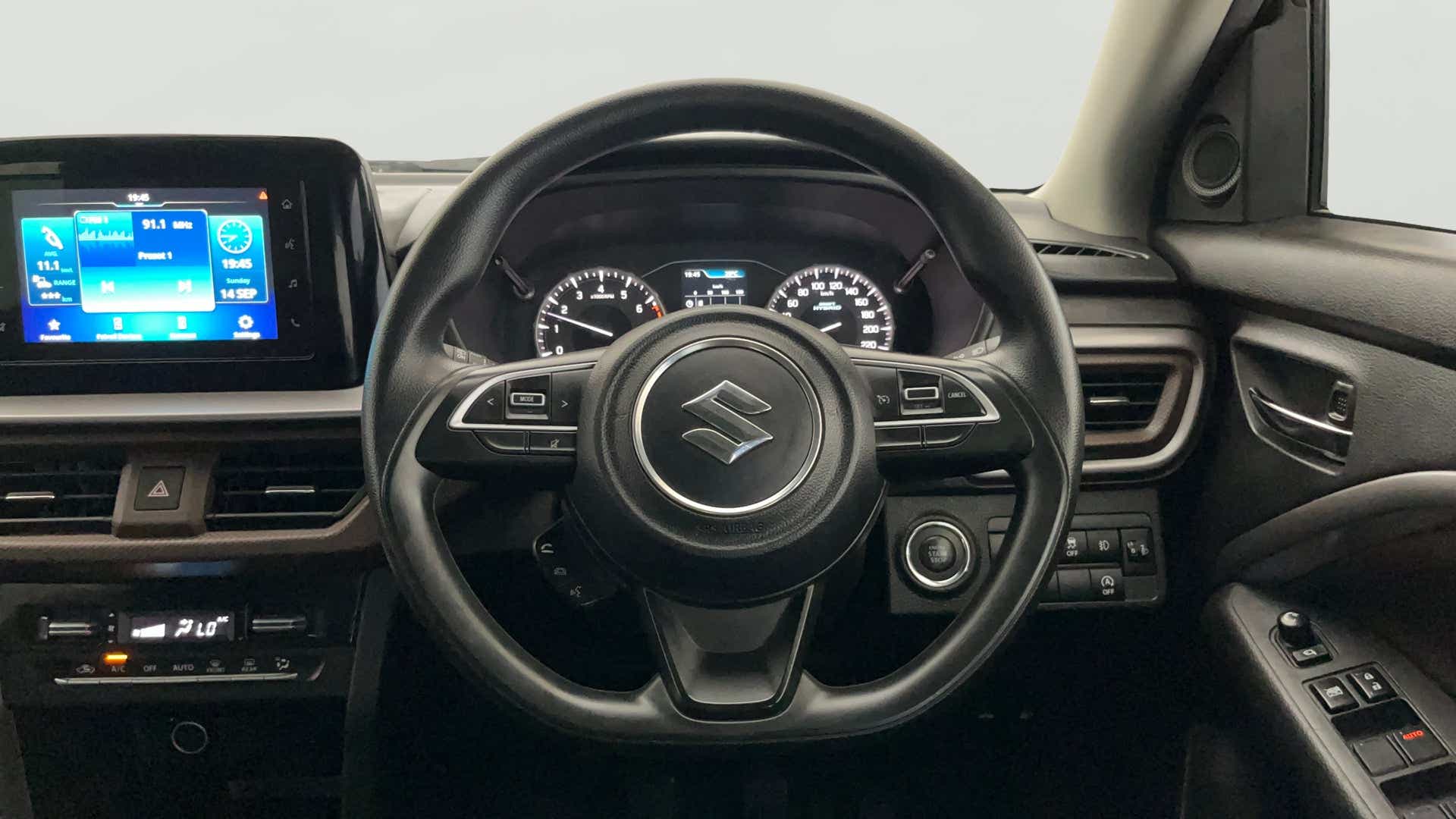 Dashboard and steering wheel of a Maruti Suzuki Brezza