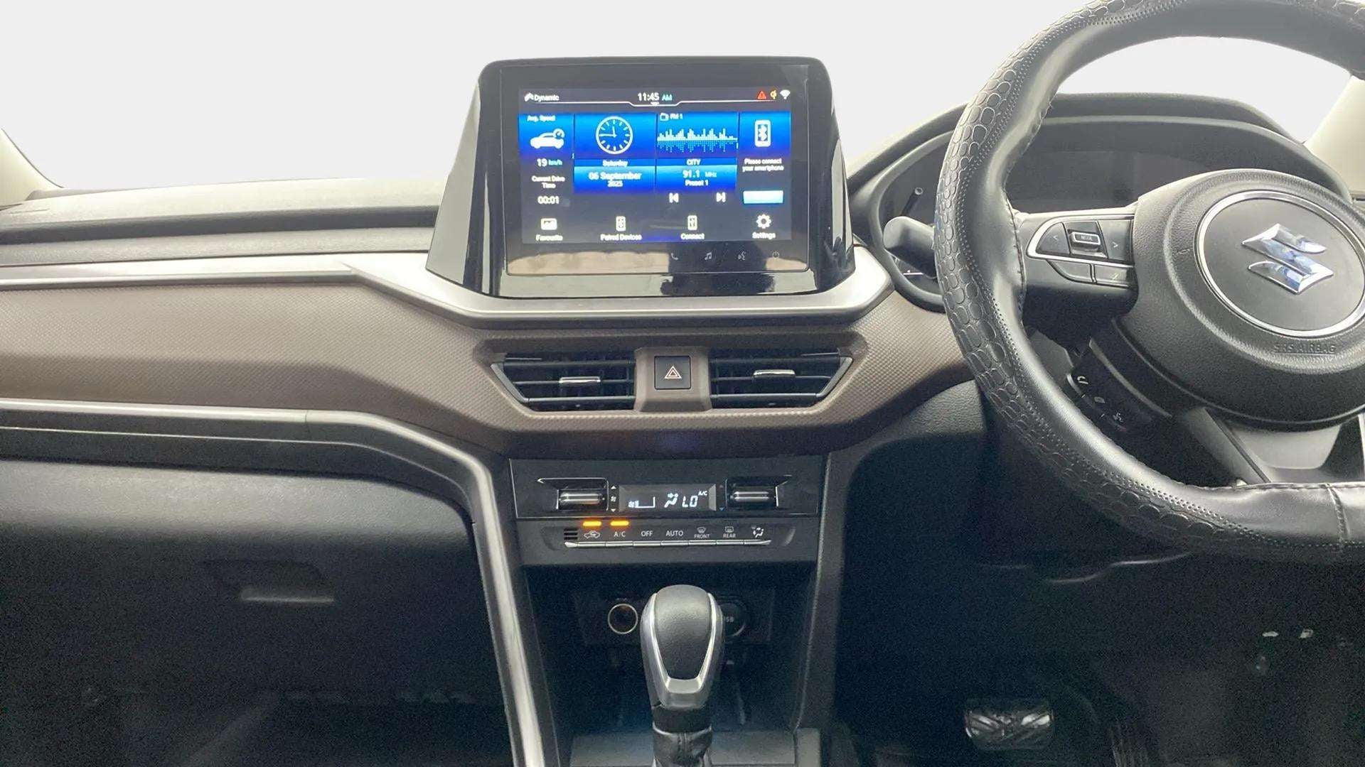 Interior dashboard view of a Maruti Suzuki Brezza