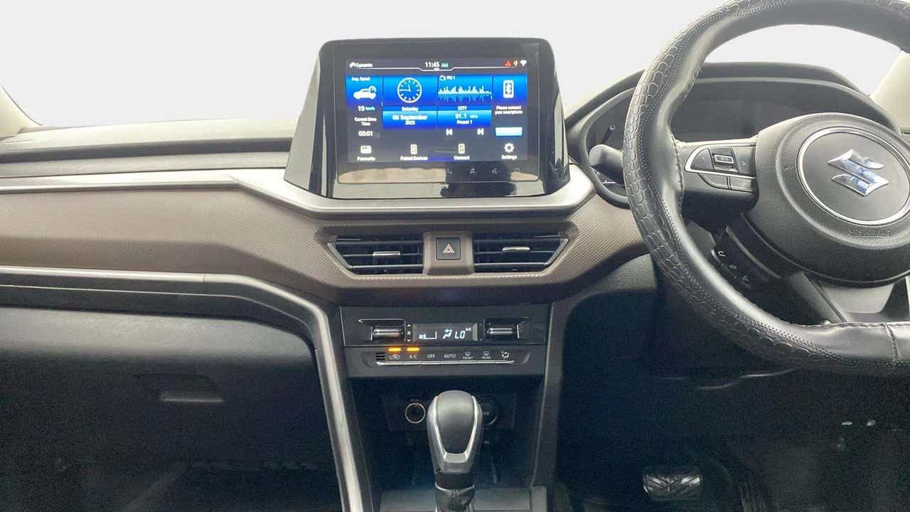 Interior dashboard view of a Maruti Suzuki Brezza