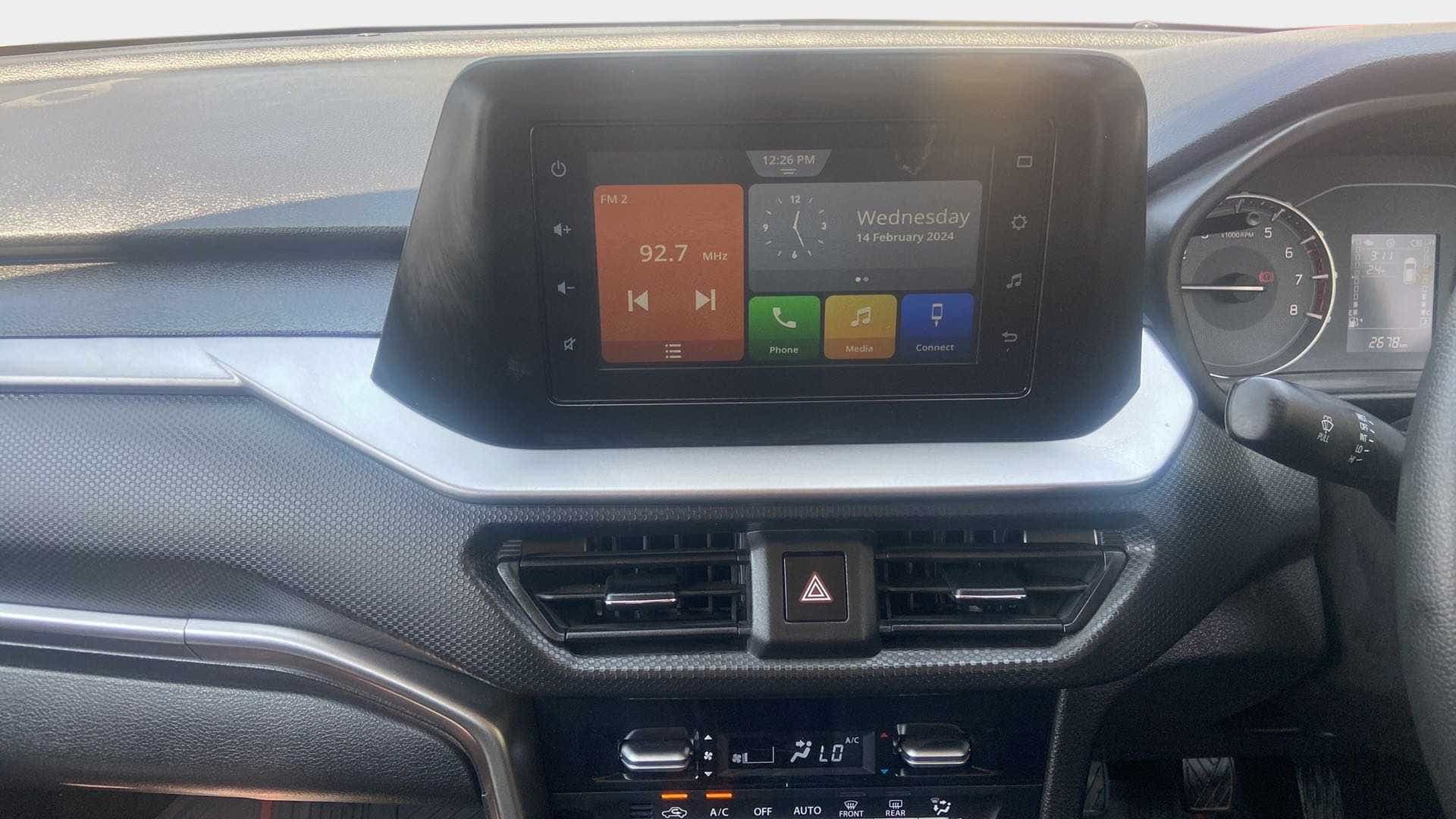 Dashboard and infotainment display of a Maruti Suzuki Brezza