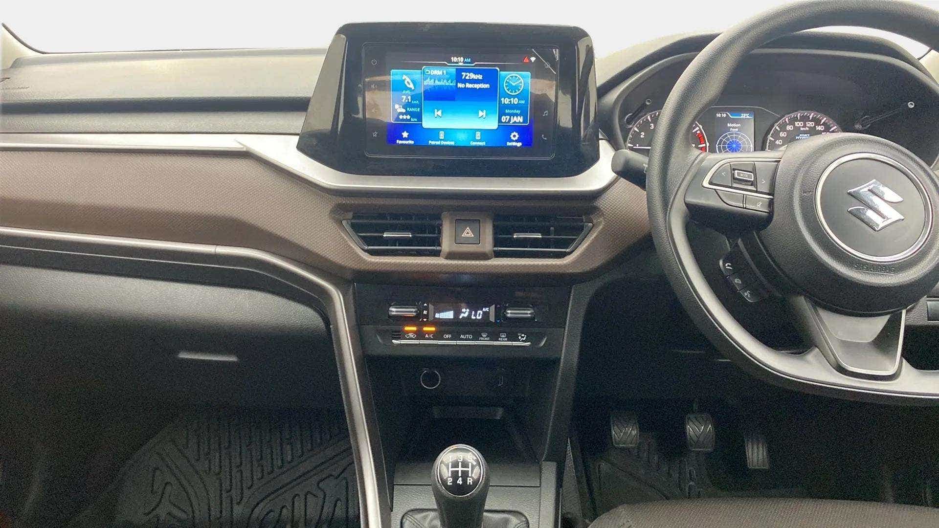 Dashboard and steering wheel view of a Maruti Suzuki Brezza