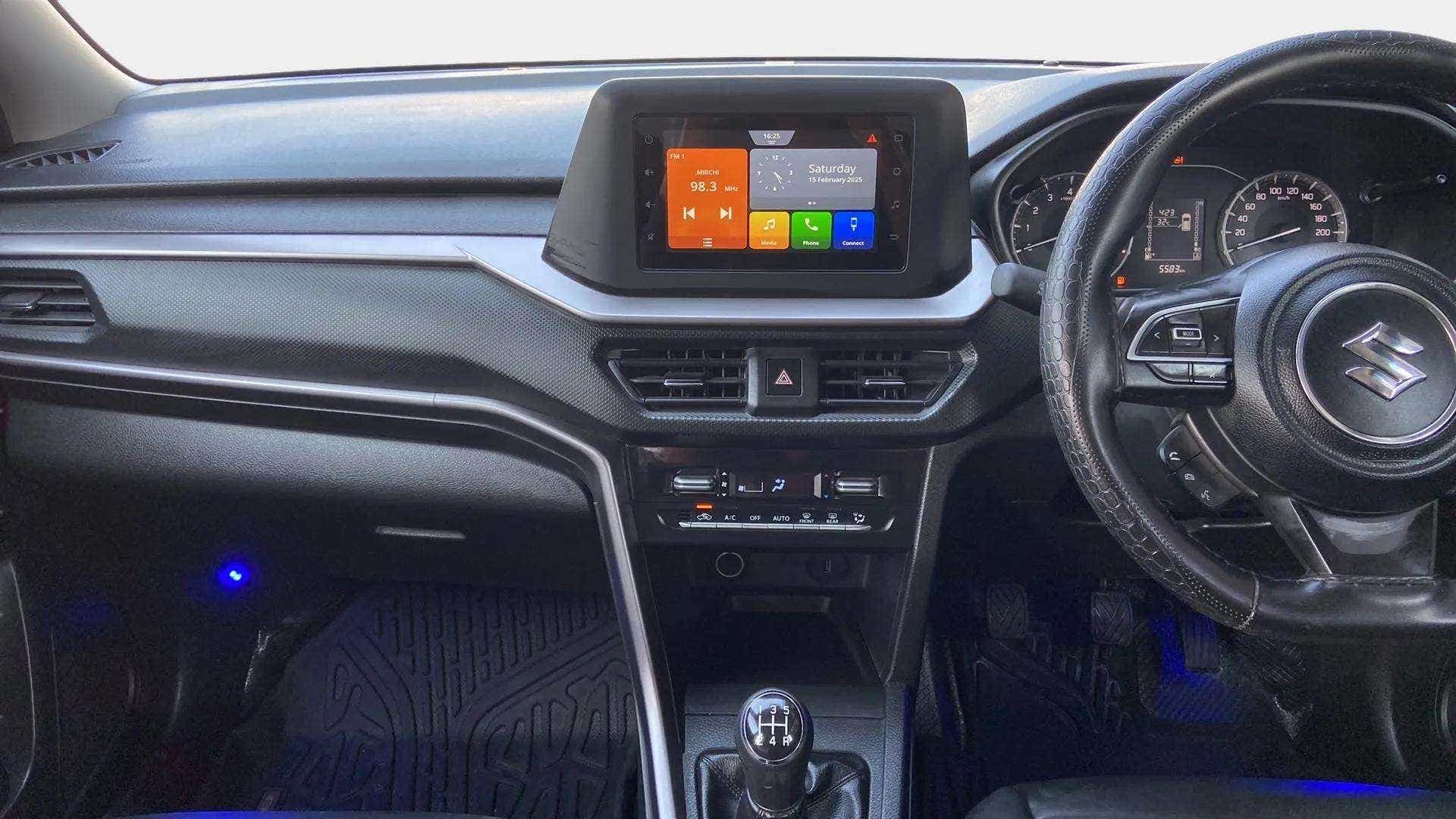 Dashboard and steering wheel of a Maruti Suzuki Brezza