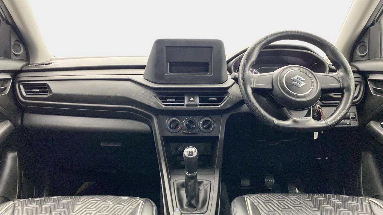 Dashboard and steering wheel view of a Maruti Suzuki Brezza