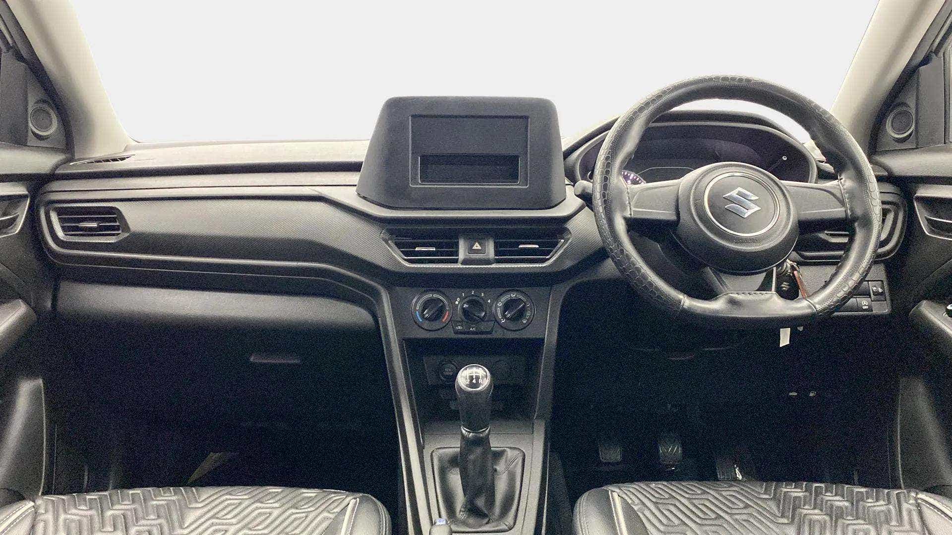 Dashboard and steering wheel view of a Maruti Suzuki Brezza