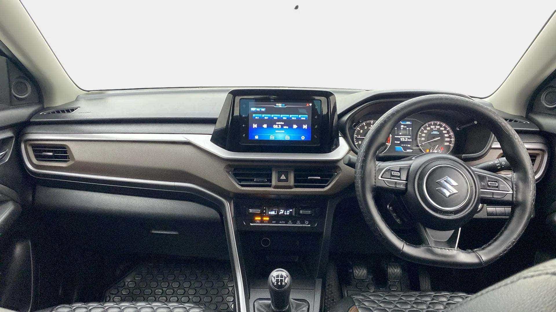 Interior dashboard view of a Maruti Suzuki Brezza