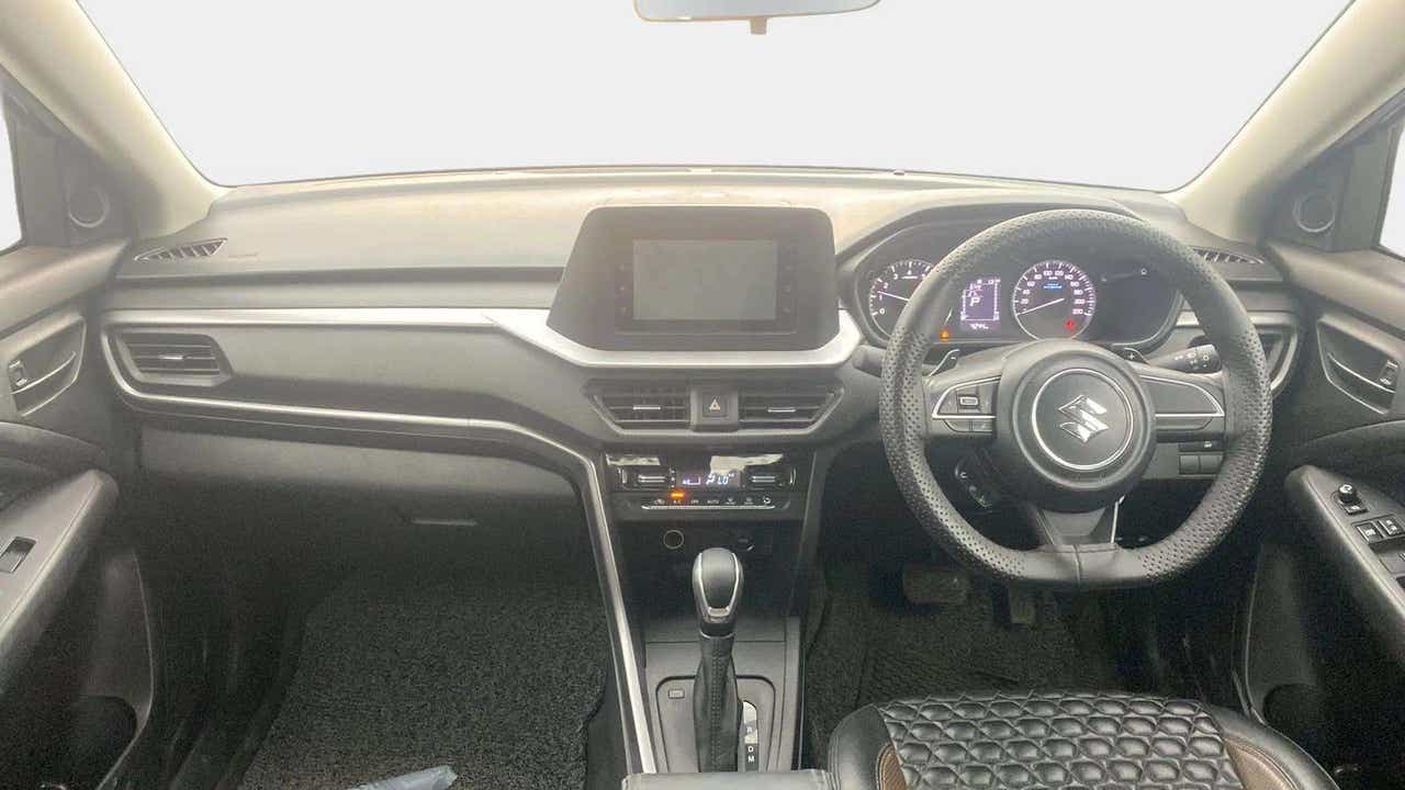 Dashboard and steering wheel view of a Maruti Suzuki Brezza