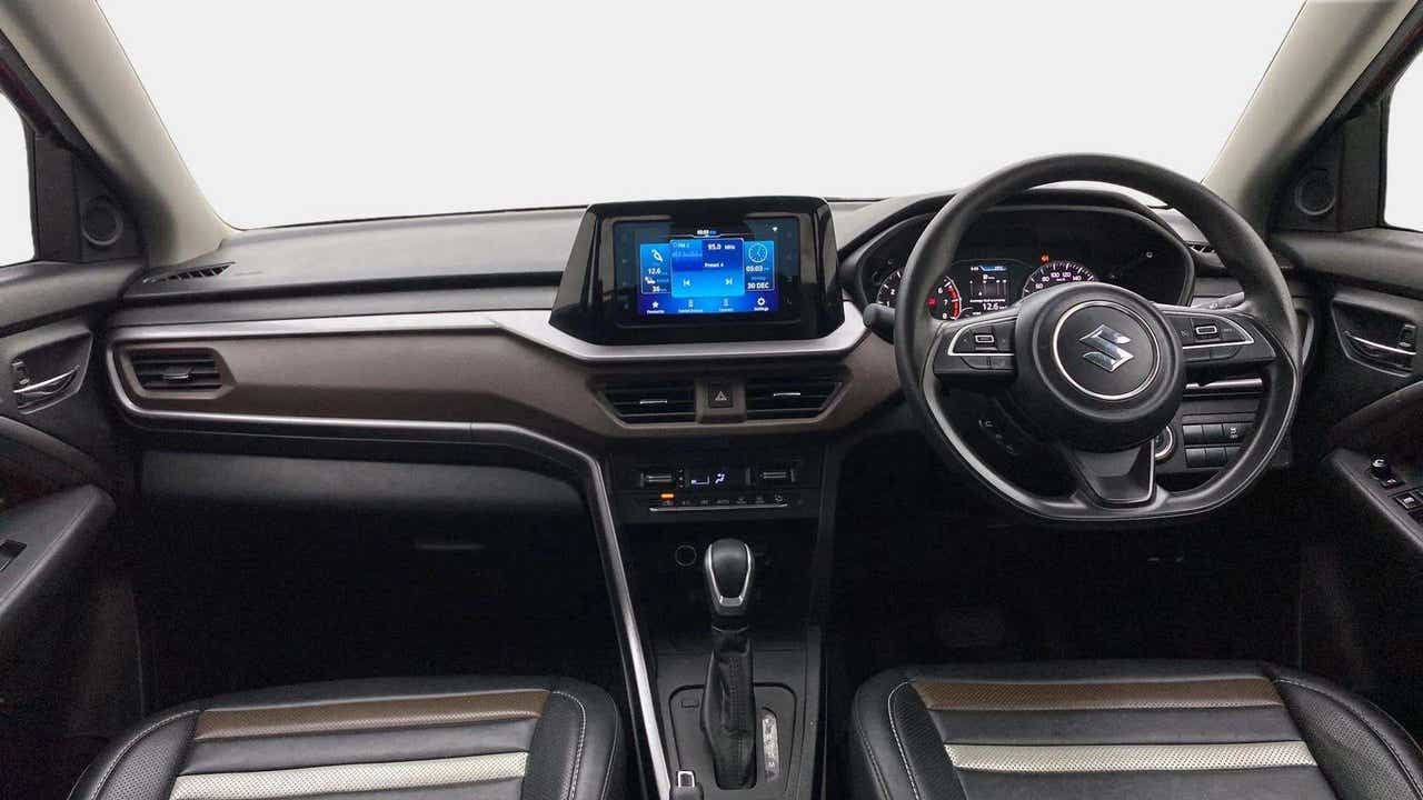 Interior dashboard view of a Maruti Suzuki Brezza