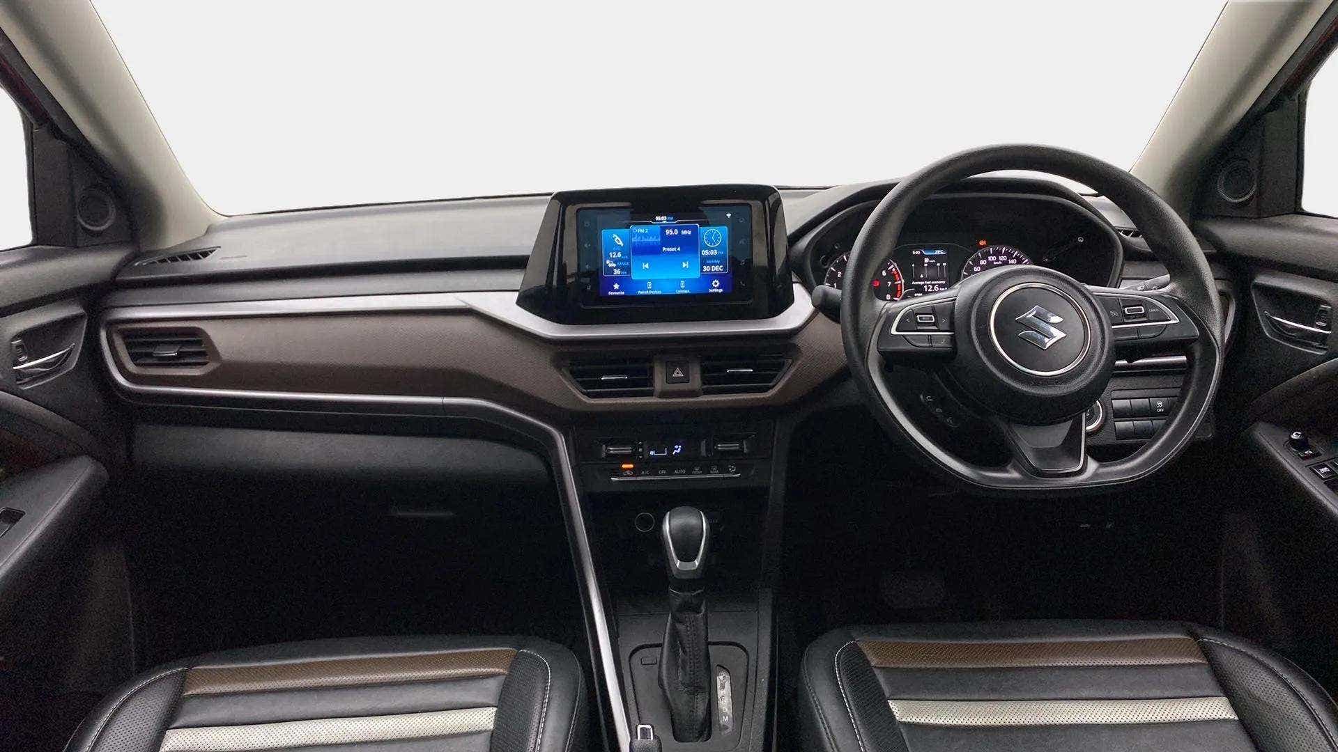 Interior dashboard view of a Maruti Suzuki Brezza