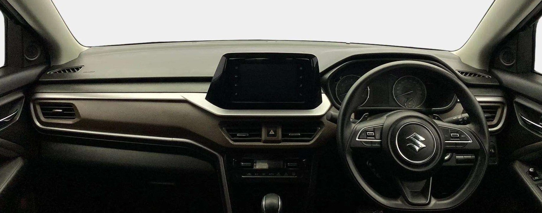 Dashboard and steering wheel of a Maruti Suzuki Brezza