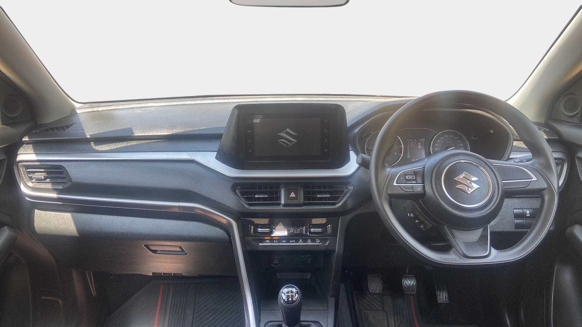 Dashboard and steering wheel view of a Maruti Suzuki Brezza