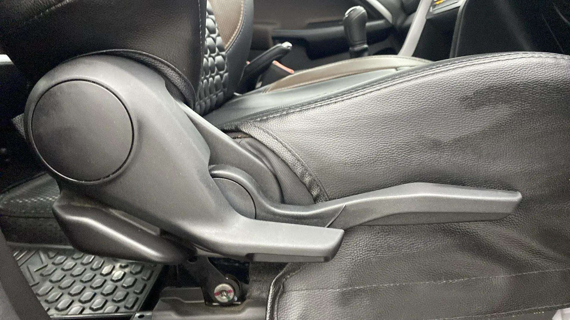 Close-up of seat adjustment lever of a Maruti Suzuki Brezza