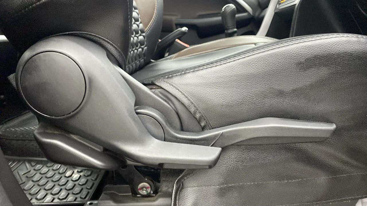 Close-up of seat adjustment lever of a Maruti Suzuki Brezza