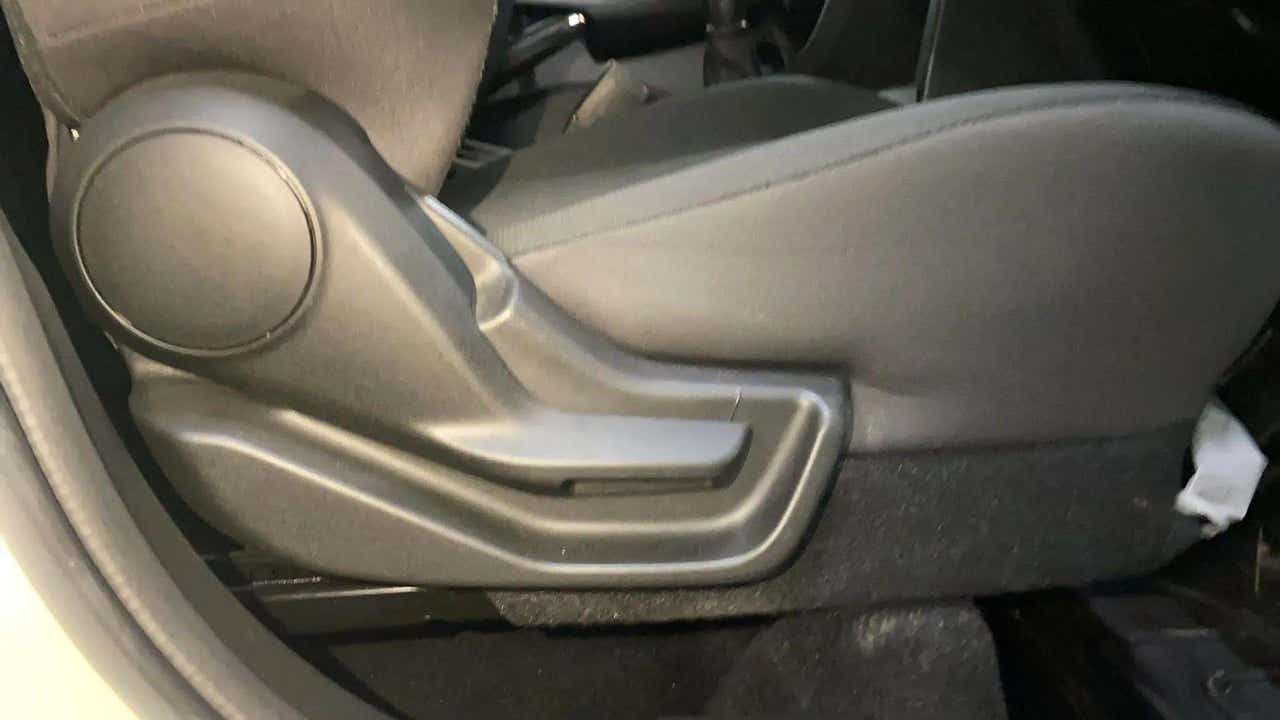 Close-up of the seat adjustment lever of a Maruti Suzuki Brezza