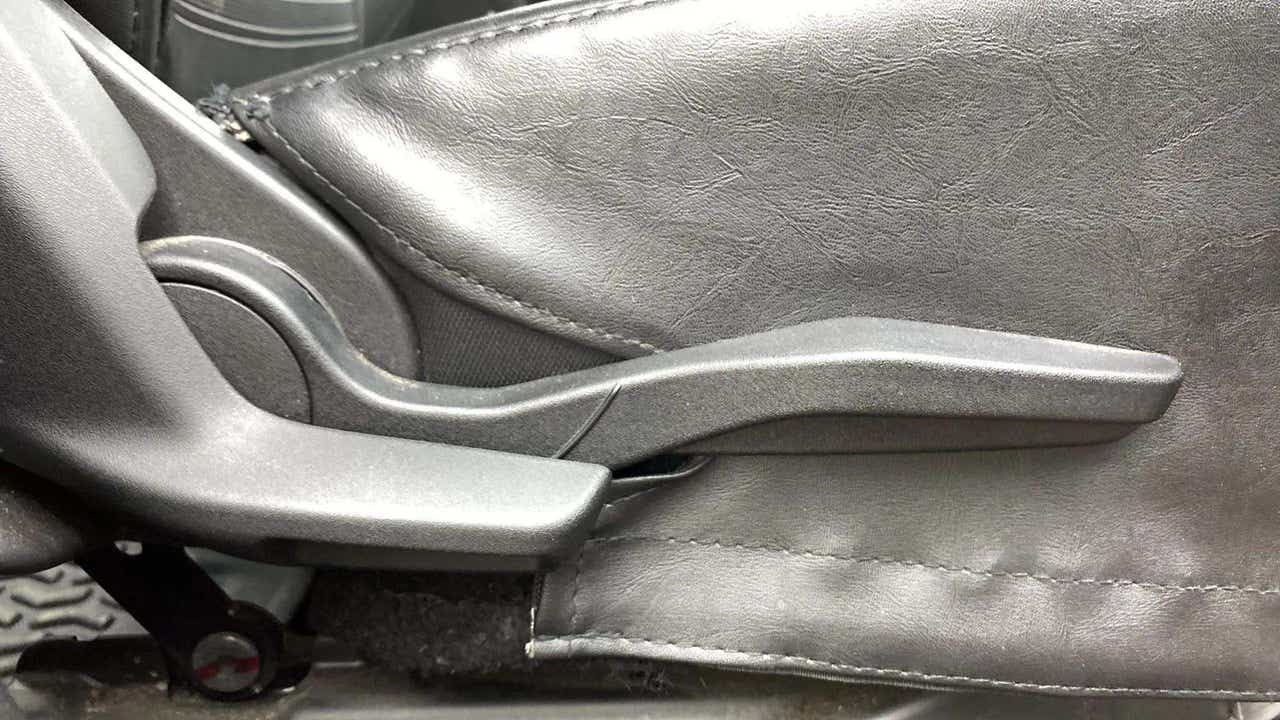 Close-up of the handbrake lever of a Maruti Suzuki Brezza
