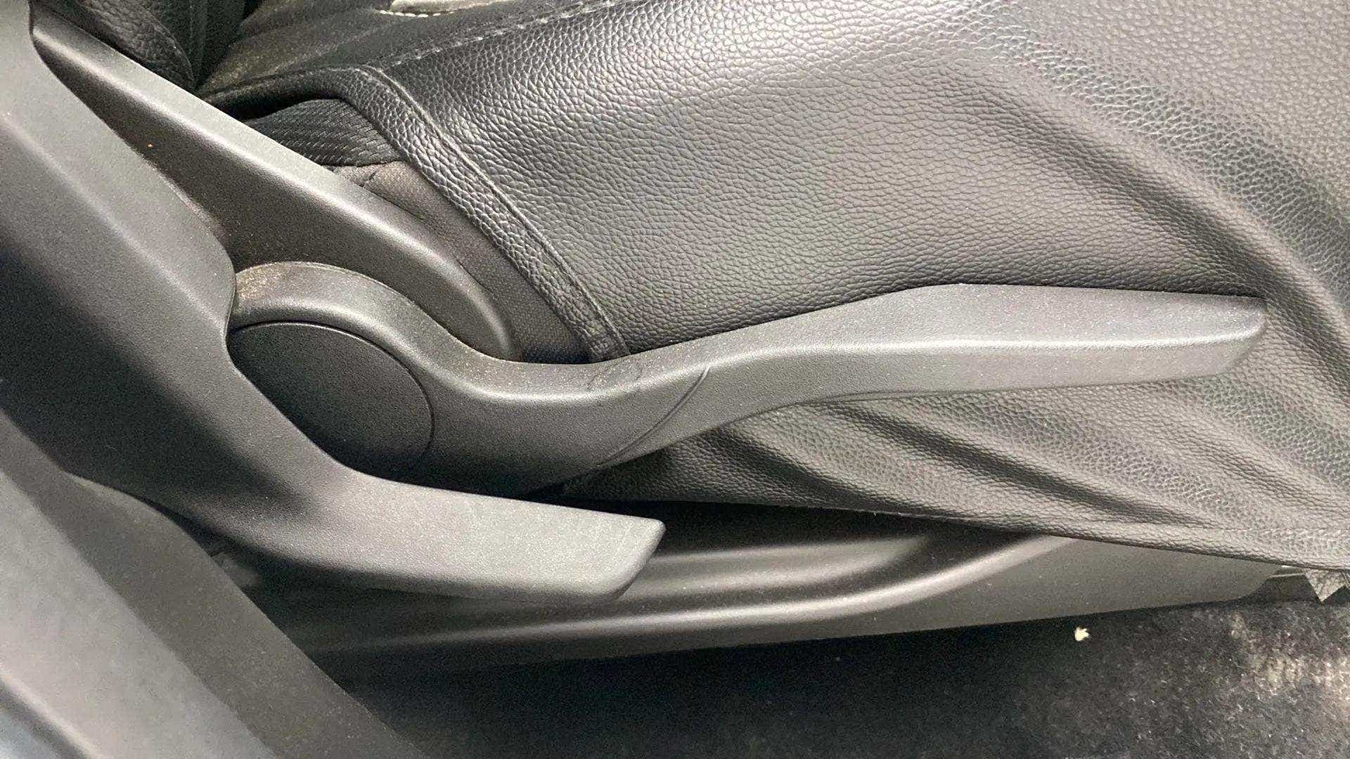 Seat adjustment handle of a Maruti Suzuki Brezza