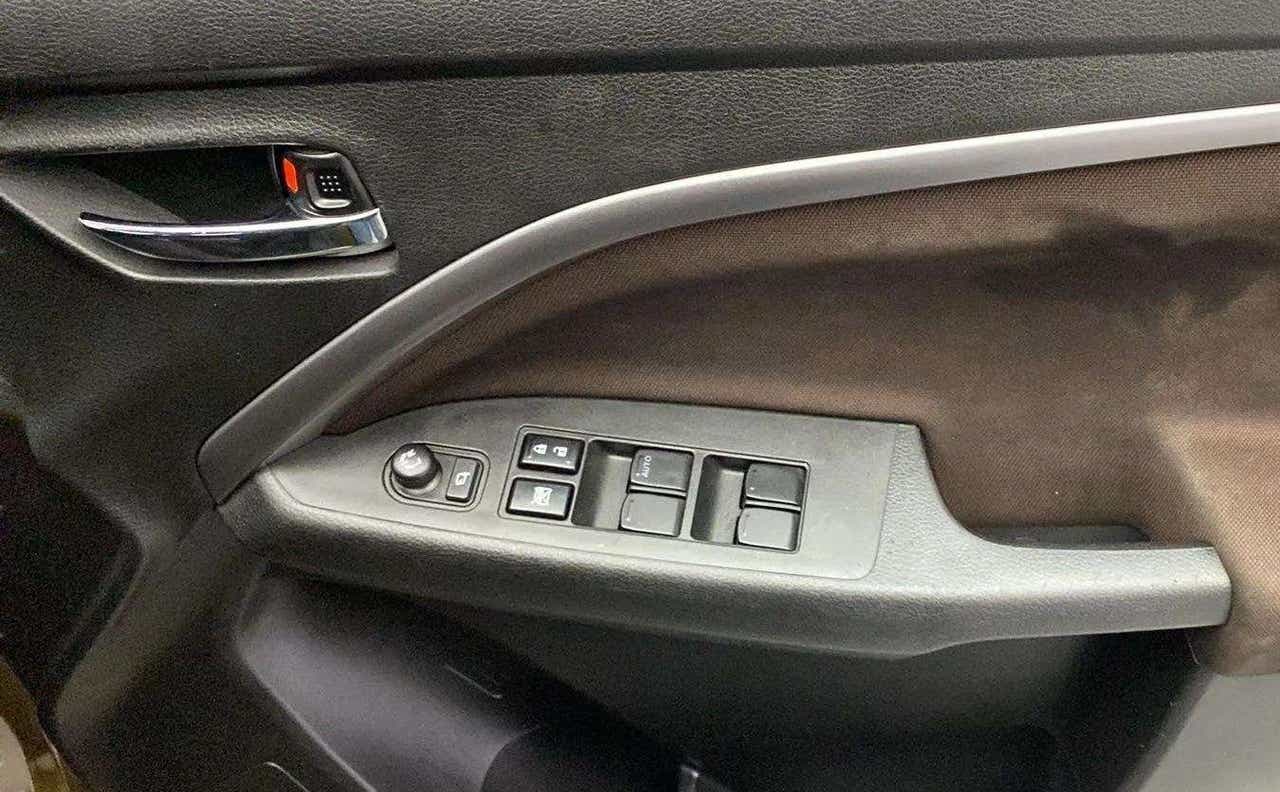 Interior door controls of a Maruti Suzuki Brezza