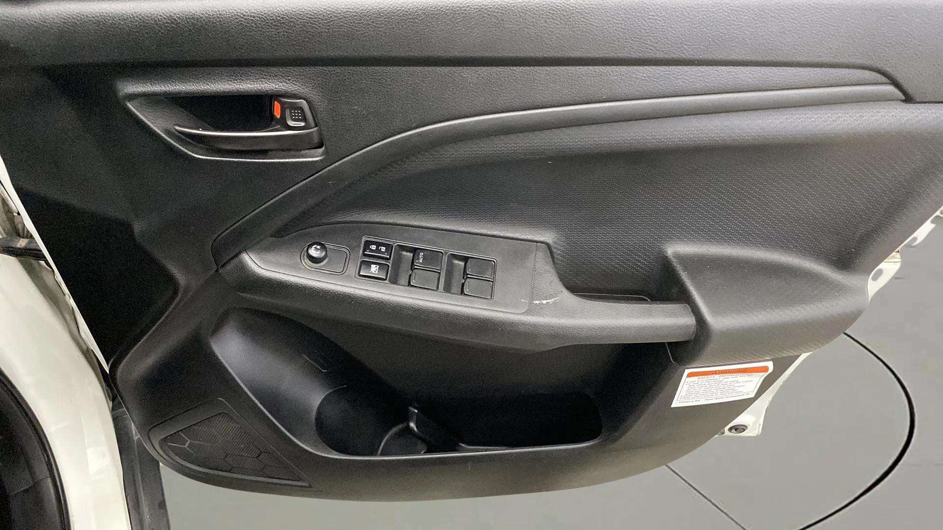 Driver side door panel of a Maruti Suzuki Brezza