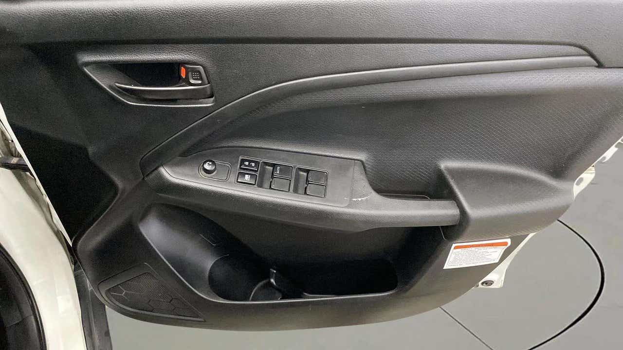 Driver side door panel of a Maruti Suzuki Brezza