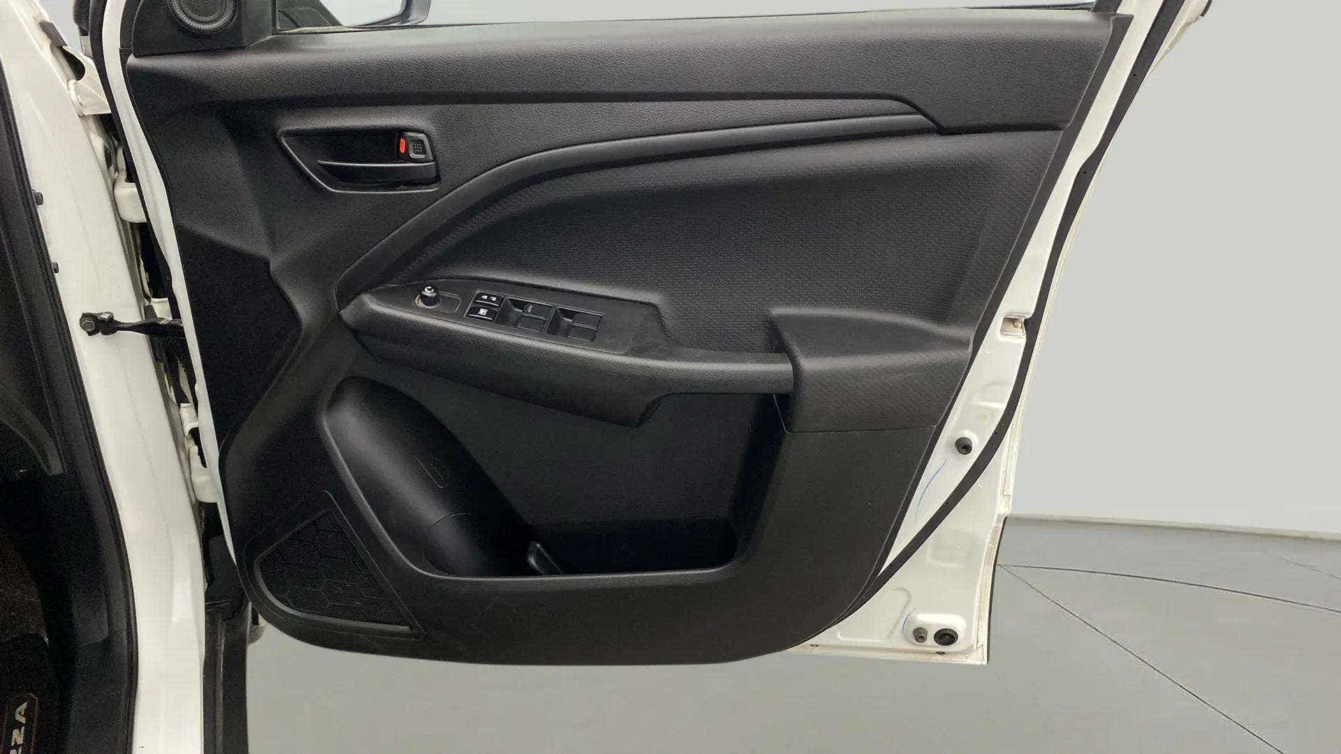 Front driver-side door panel of a Maruti Suzuki Brezza