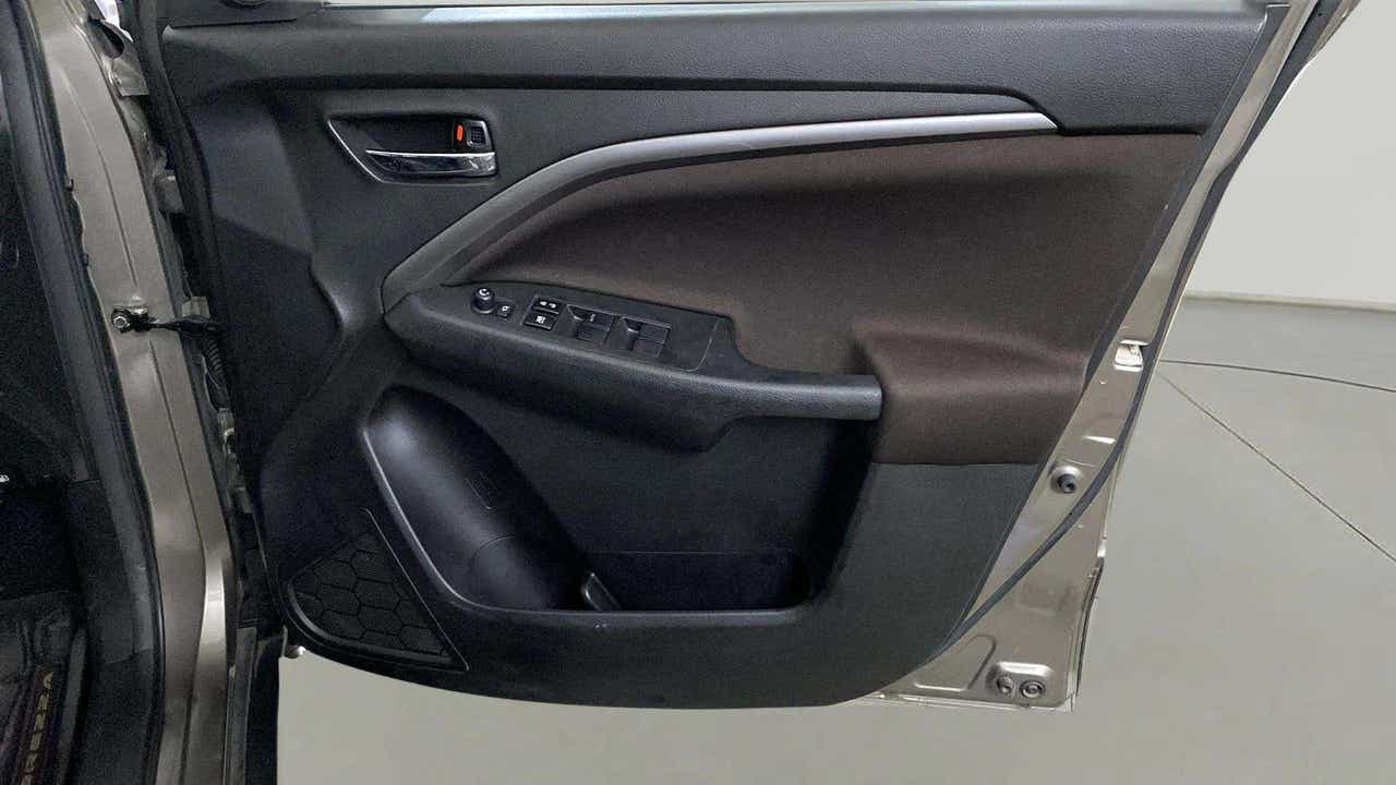 Interior door panel of a Maruti Suzuki Brezza