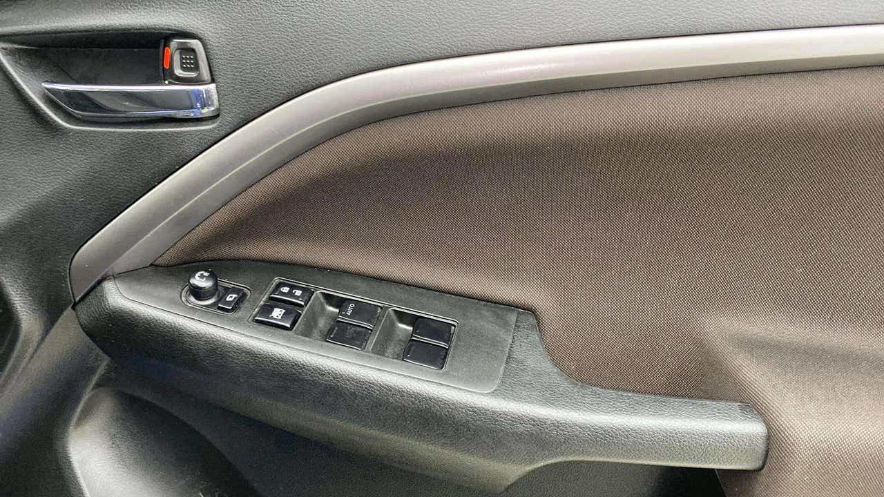 Interior door panel of a Maruti Suzuki Brezza