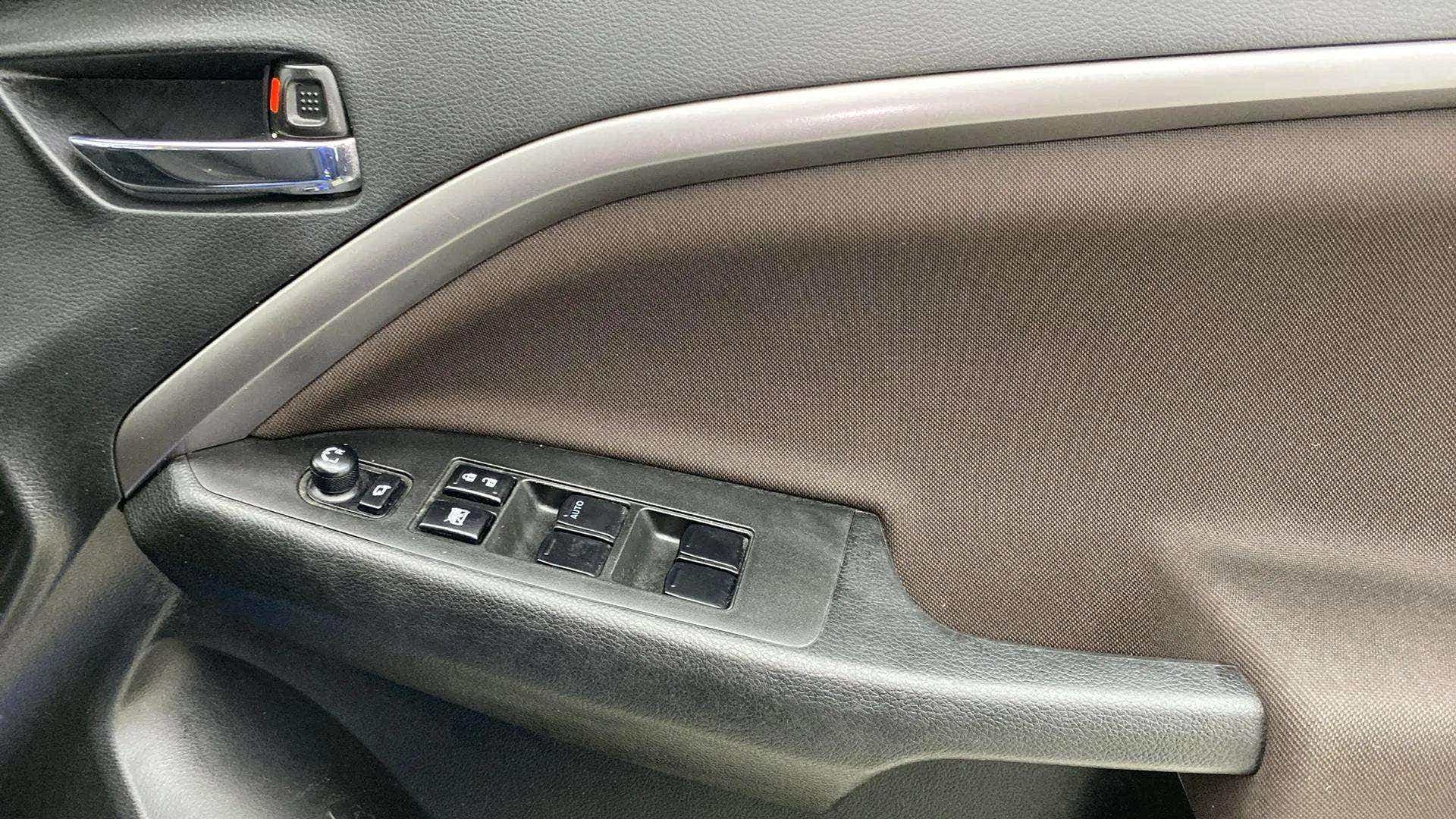 Interior door panel of a Maruti Suzuki Brezza