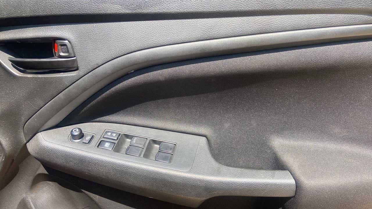 Interior door panel of a Maruti Suzuki Brezza