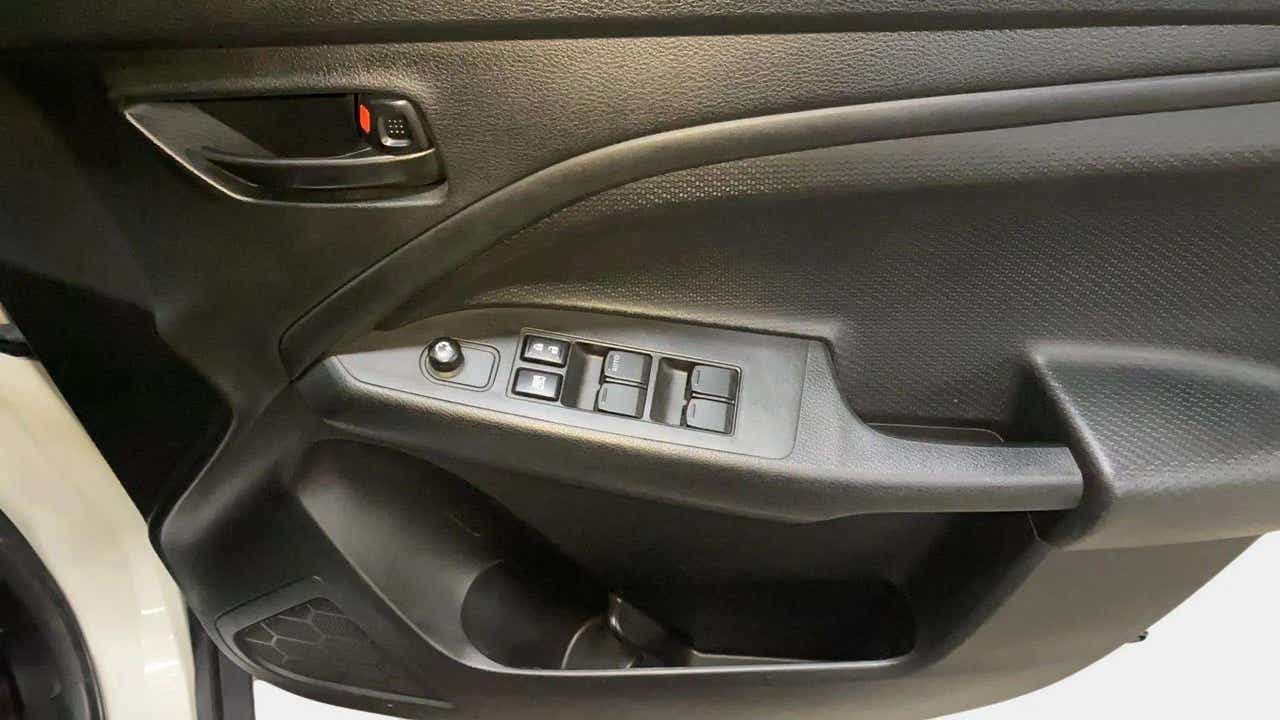 Driver-side door controls of a Maruti Suzuki Brezza
