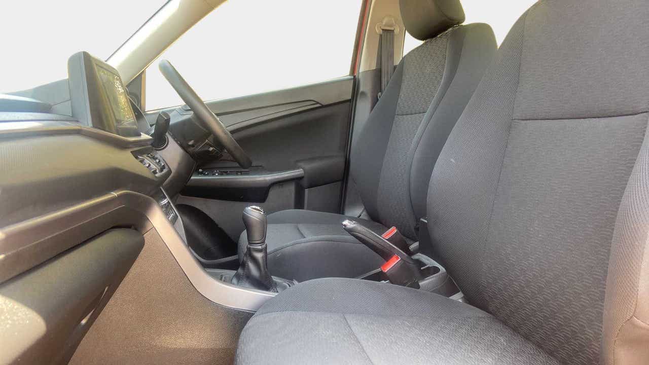 Interior front seats and dashboard of a Maruti Suzuki Brezza