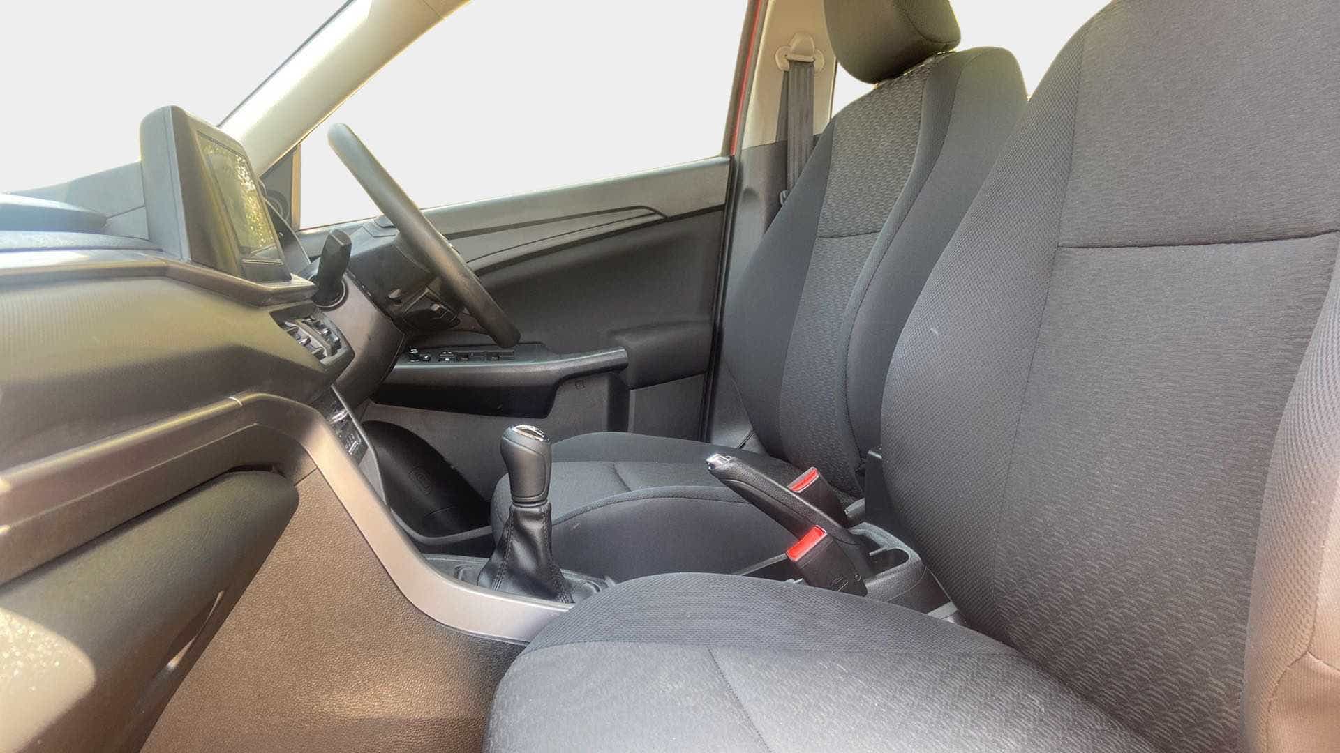 Interior front seats and dashboard of a Maruti Suzuki Brezza