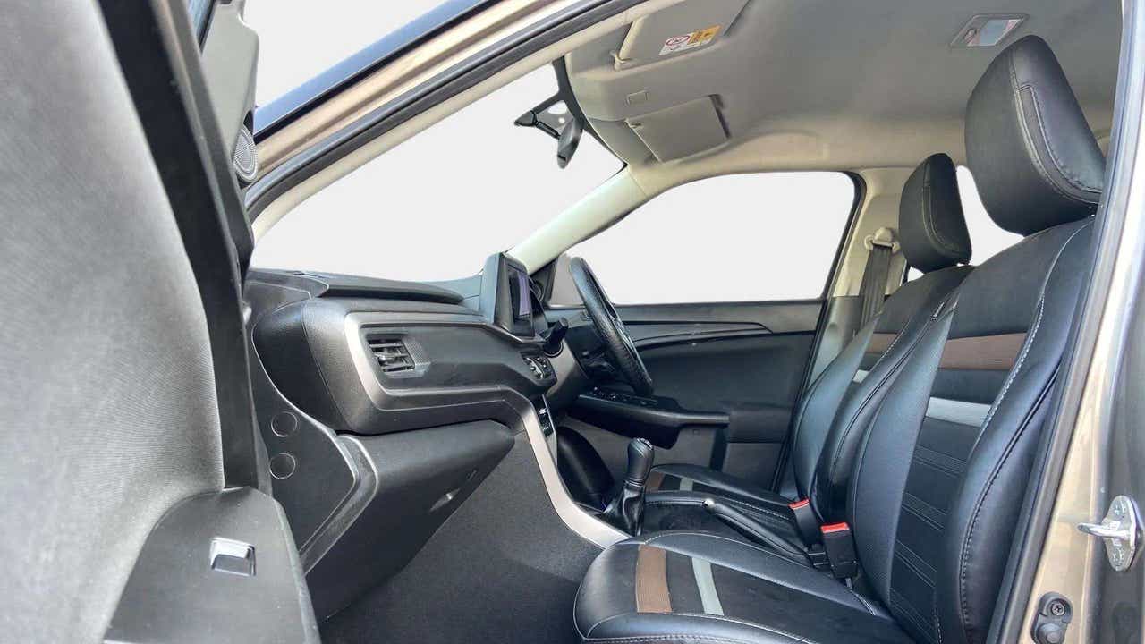 Dashboard and front seats of a Maruti Suzuki Brezza