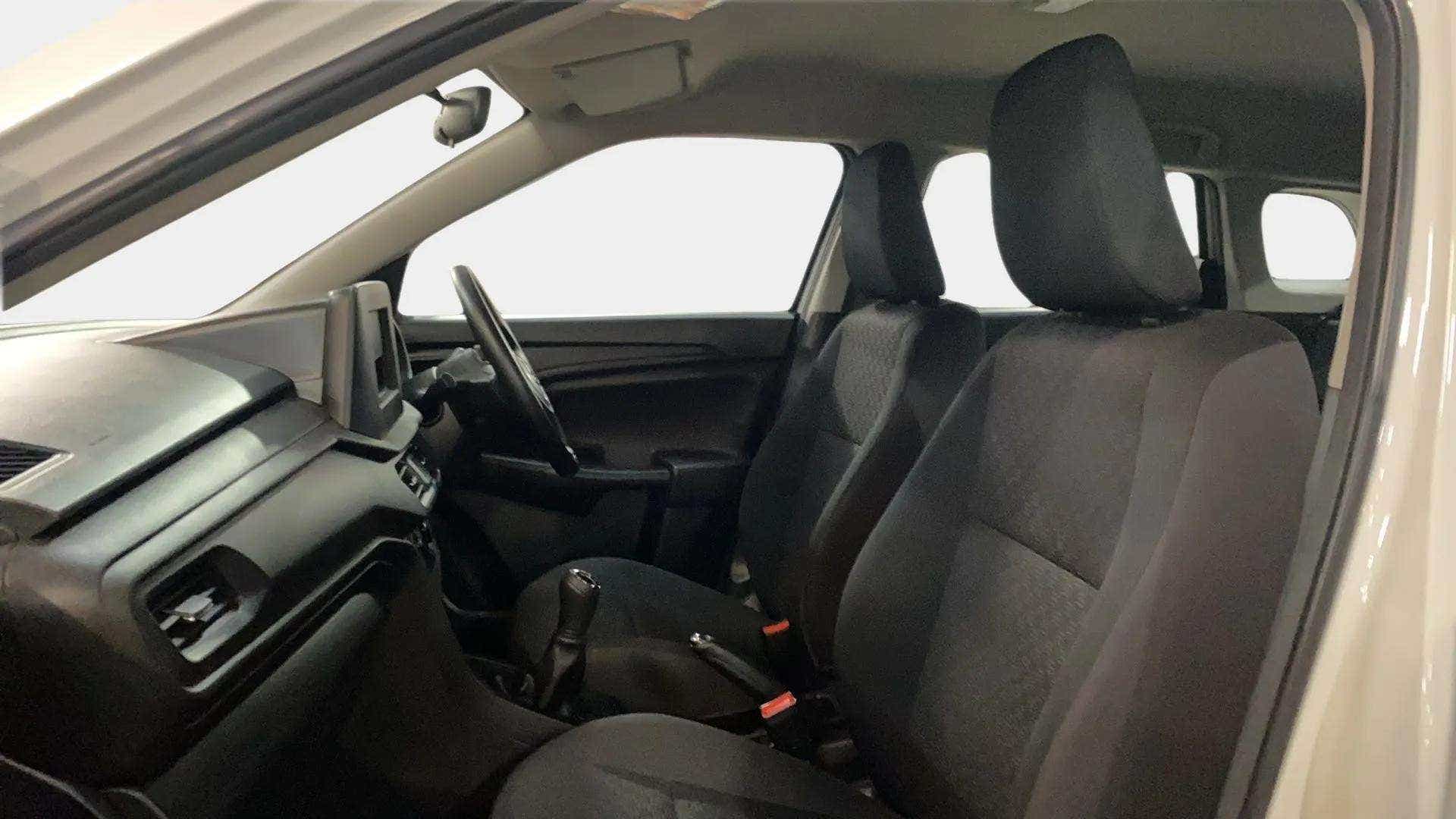 Interior front seat view of a Maruti Suzuki Brezza