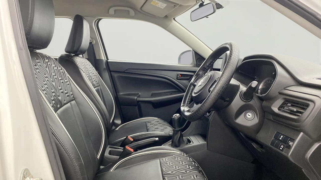 Interior front seats and dashboard of a Maruti Suzuki Brezza