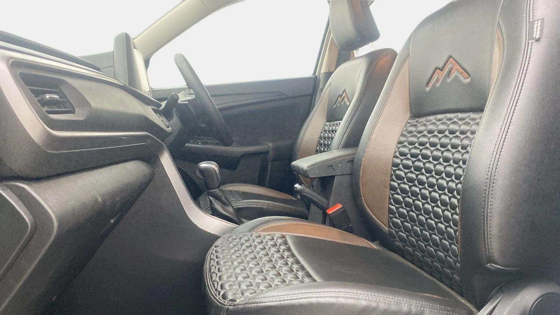 Front seats and dashboard interior of a Maruti Suzuki Brezza