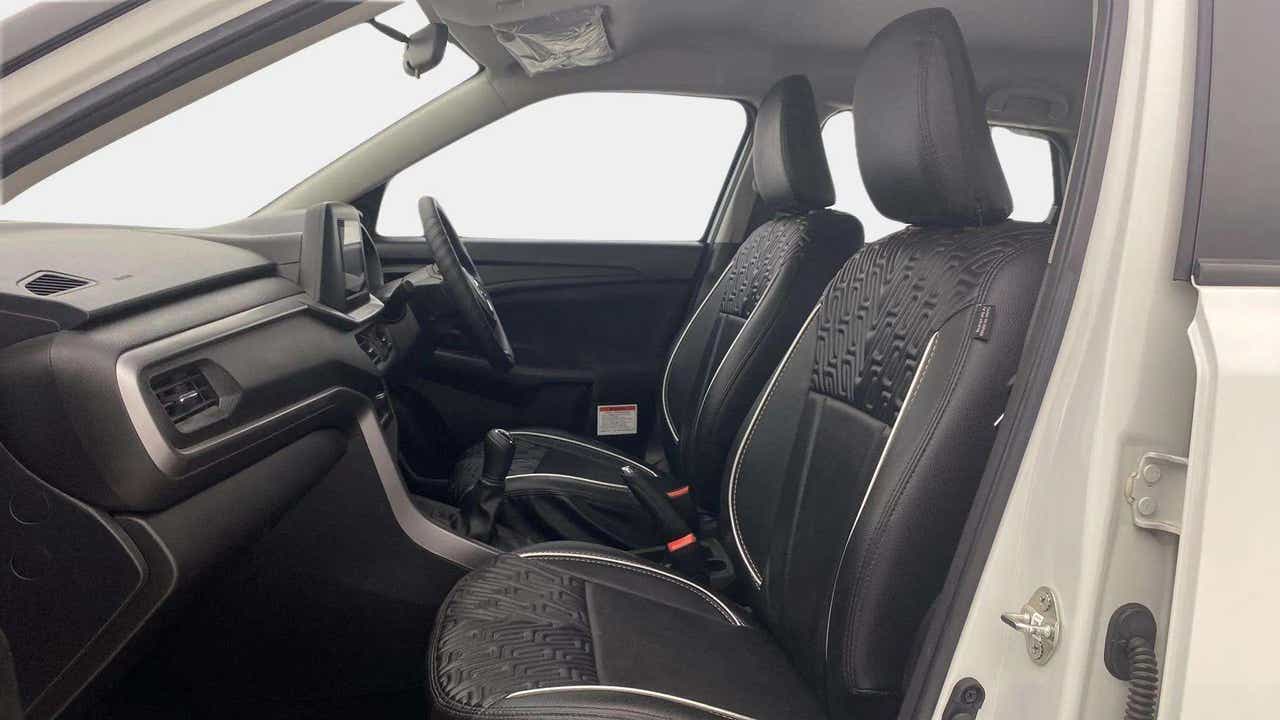 Interior front seats and dashboard of a Maruti Suzuki Brezza