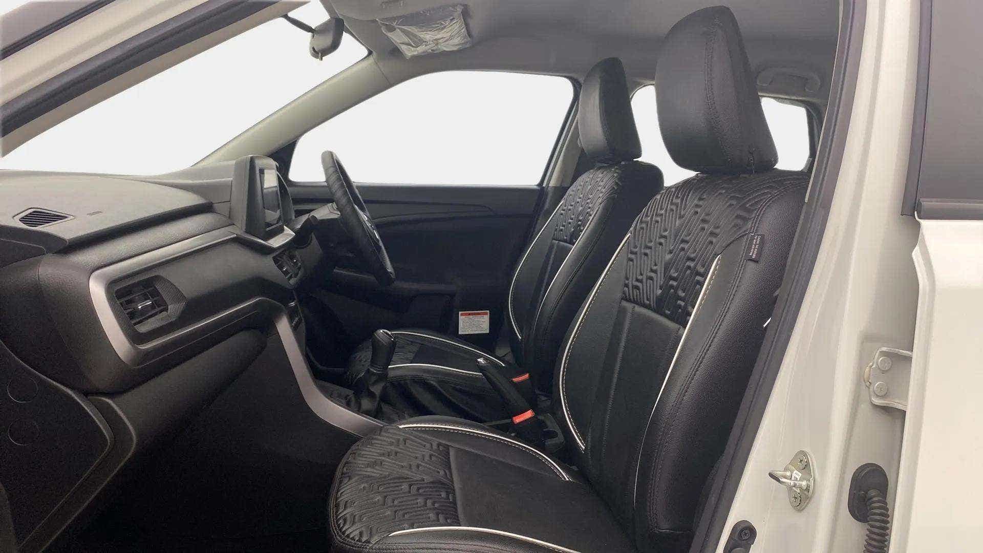 Interior front seats and dashboard of a Maruti Suzuki Brezza