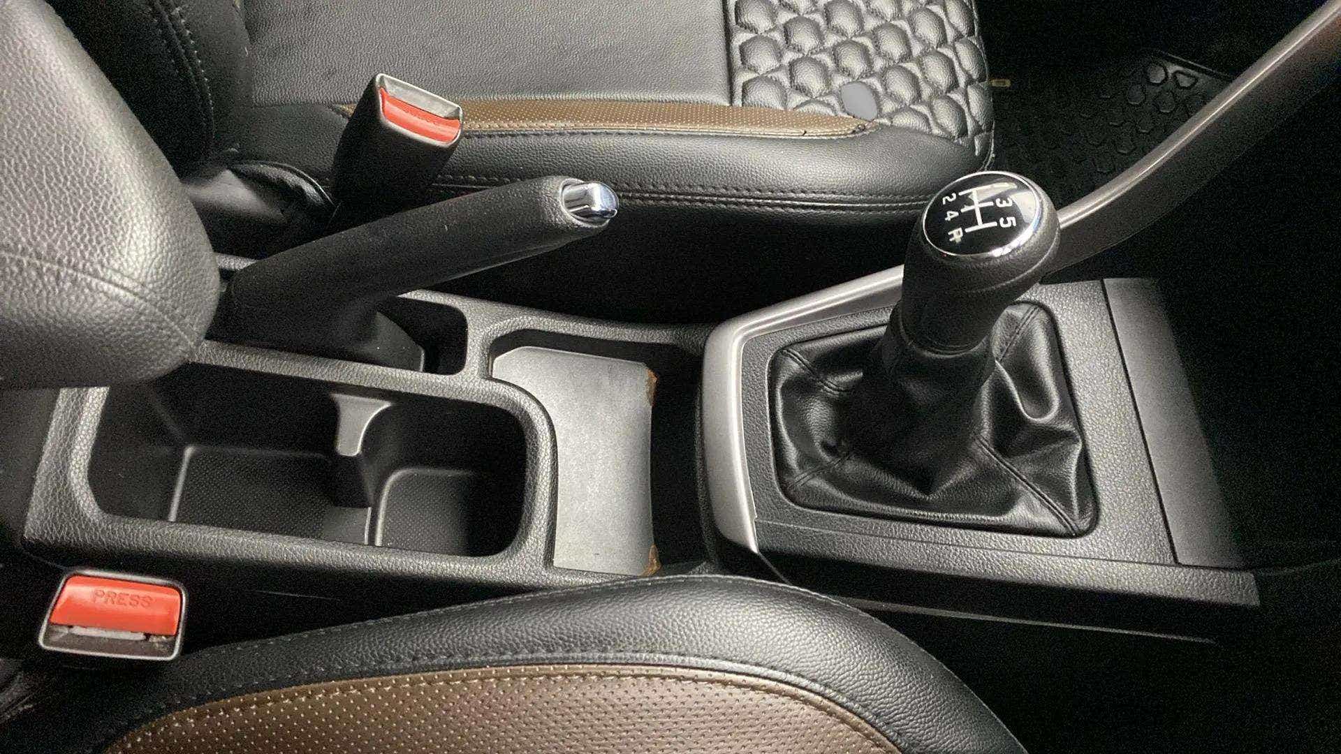 Center console and gear lever of a Maruti Suzuki Brezza
